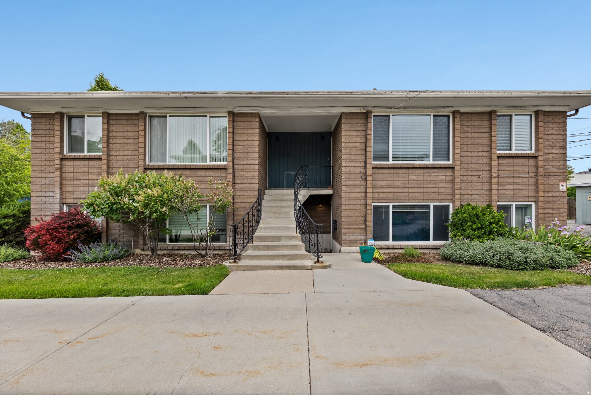 Don't miss this outstanding opportunity to own a well-maintained fourplex in the highly desirable Sugar House area, known for its quiet residential streets, strong rental demand, and convenient access to shopping, dining, and public transportation. Ideally located near the TRAX station, this property offers excellent connectivity while maintaining the charm of an established neighborhood.  This multifamily property features four 2-bedroom, 1-bathroom units, each offering a comfortable layout with a spacious living area, kitchen, dining space, and in-unit laundry.  A major advantage for investors is the property's utility structure: tenants are responsible for their own gas and electricity, while the owner pays for water, sewer, and garbage, helping simplify management and operating expenses.  The property also includes one covered carport parking space per unit, along with additional storage areas for tenant convenience. The durable brick exterior and established grounds contribute to the property's long-term appeal and low-maintenance ownership.  Whether you're looking to expand your investment portfolio or secure a dependable income-producing asset, this fourplex presents an excellent opportunity in one of Salt Lake City's most sought-after neighborhoods, offering strong rental demand and long-term growth potential.