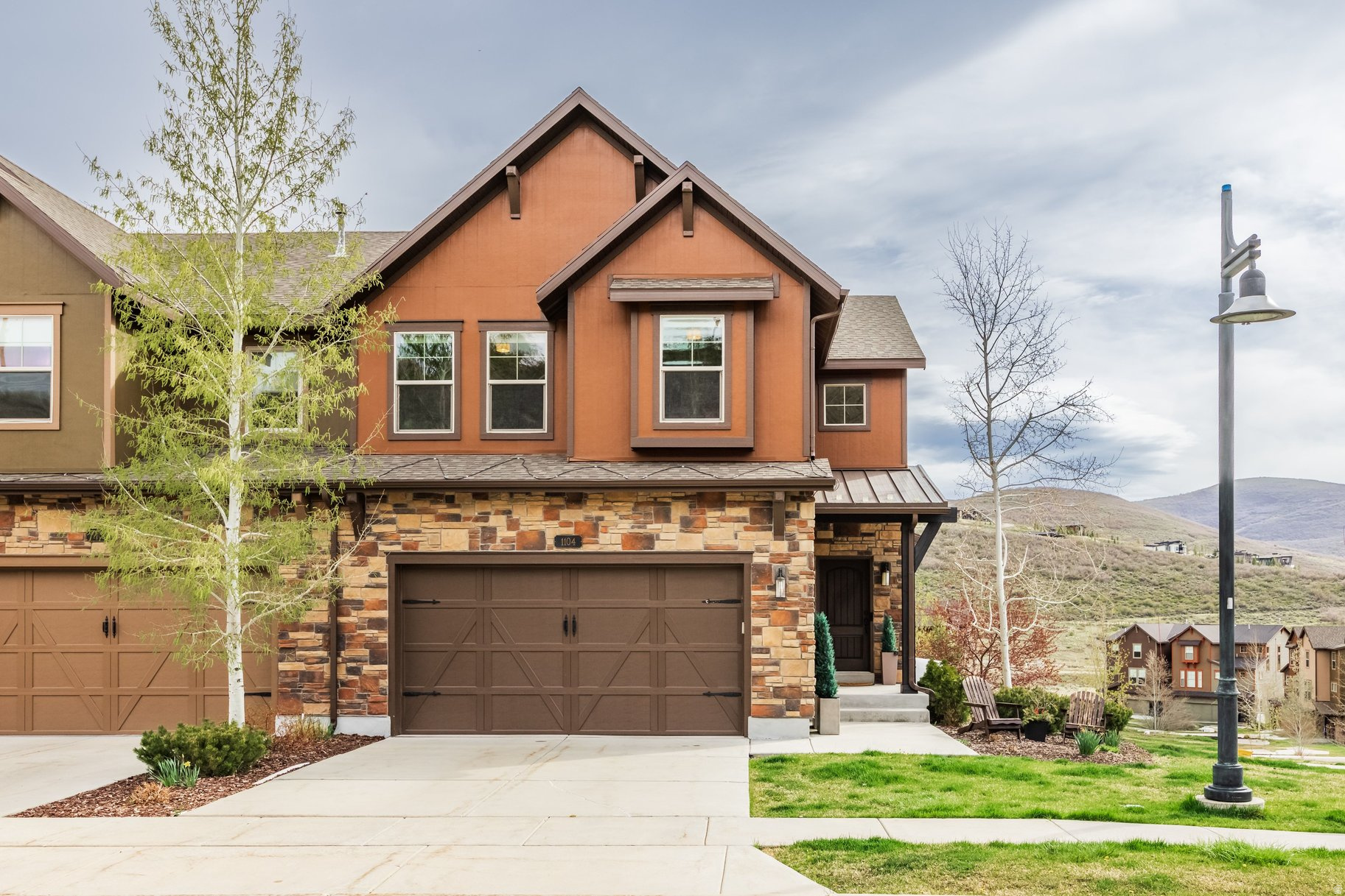 Beautifully maintained and thoughtfully updated, this corner-lot townhome at The Retreat at Jordanelle offers a rare blend of comfort, convenience, and effortless mountain living. Ideally located just minutes from Deer Valley's expanding East Village and the recreational amenities of Jordanelle Reservoir, the home provides exceptional access to year-round adventure. Thoughtfully designed with four bedrooms and multiple living spaces, the layout is well-suited for both full-time living and vacation use, offering flexibility for hosting family and guests. New hardwood floors add warmth and sophistication, while large windows invite natural light throughout the living spaces. Recent updates, including new wool carpeting, a new oven and dishwasher, and a new hot water heater, enhance both comfort and peace of mind. After a day on the slopes or the lake, unwind in your private hot tub, offering a peaceful setting to relax and take in the surrounding mountain air. The attached two-car garage provides ample storage for vehicles and outdoor gear, perfect for enjoying Park City's active lifestyle. As part of The Retreat at Jordanelle community, residents enjoy access to a 4,100+ square foot clubhouse featuring a pool, hot tub, fitness center, and theatre room. With HOA-maintained exterior care, including snow removal, landscaping, and irrigation, this home delivers a truly low-maintenance lifestyle, allowing more time to enjoy skiing, boating, and hiking. Conveniently located approximately 10 minutes to Park City's Historic Main Street and within easy reach of Salt Lake City International Airport, this residence offers an ideal balance of mountain serenity and everyday accessibility. Whether you're seeking a primary residence, weekend escape, or investment opportunity, this residence presents an exceptional value in one of the area's most desirable communities.