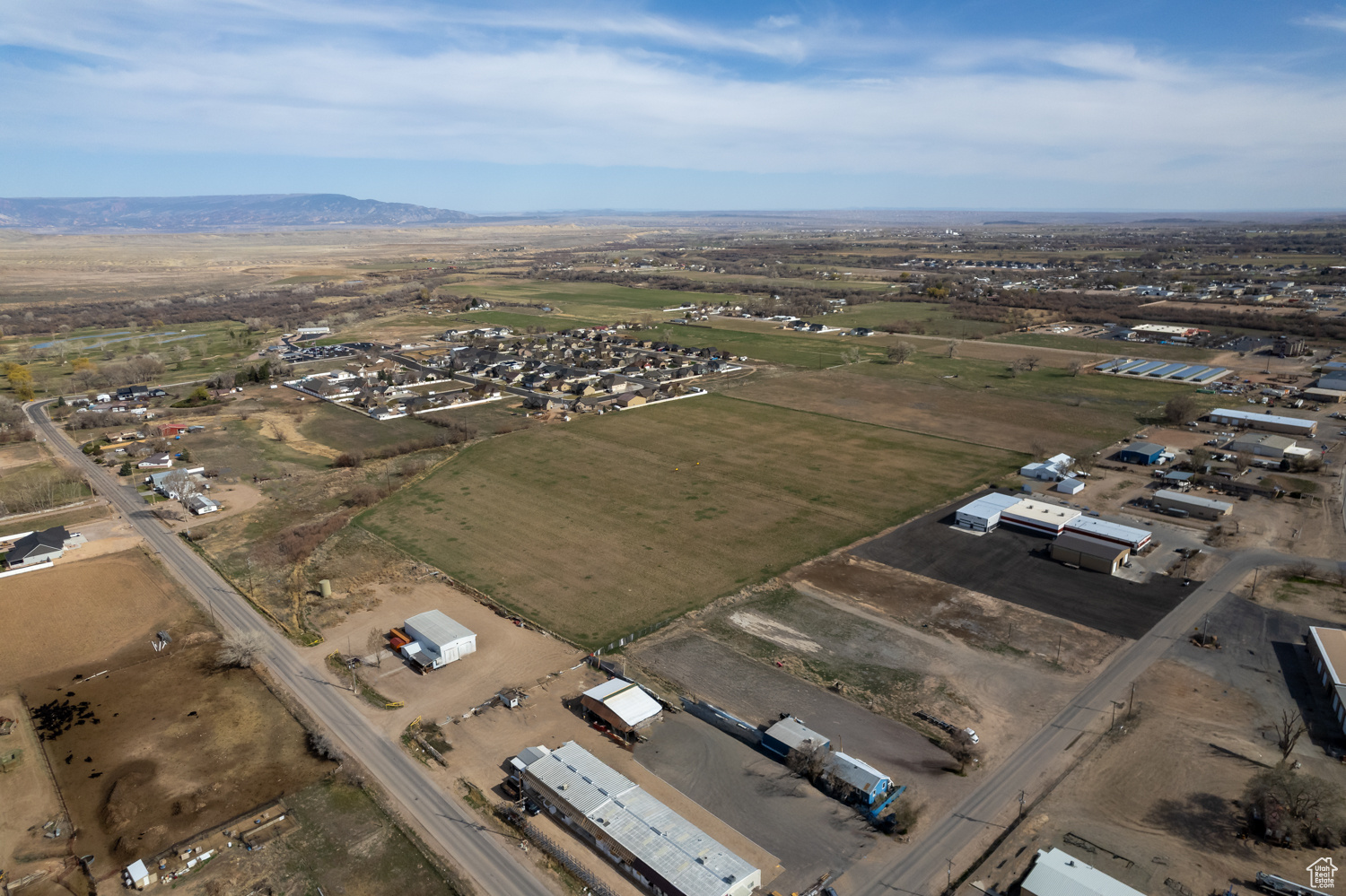 Such a great opportunity - 27.11 acres zoned Industrial and RA-2.  Industrial frontage off from 1500 East and Right of Way to area that sits behind Ironwood Subdivision. Access available from 500 South also.   Water meter, sewer line and power.  There are two manholes on the property. Taxes are based on Greenbelt - buyer to pay rollback taxes.  Buyer to verify all information.