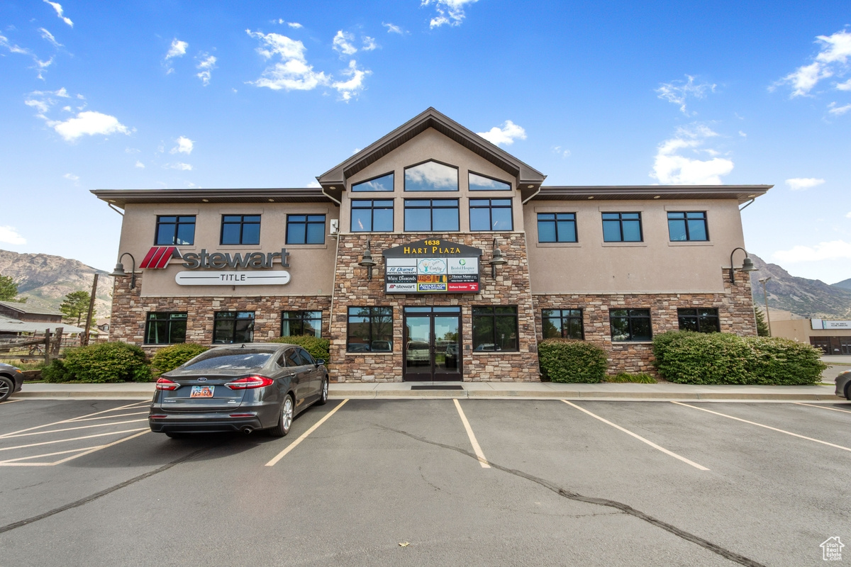 Office Building For Sale at 1638 N. Washington Blvd N., Ogden, UT presents an outstanding owner-user or investment opportunity in a high-traffic North Ogden corridor. This well-maintained, two-story office property offers approximately 12,865 square feet on a generous 0.72-acre site, combining strong street presence with practical functionality. Built in 2007, the building features restrooms on both floors, front and rear entrances, and convenient parking access from both the front and back of the property. With 32 parking stalls, the site is well-positioned to accommodate employees, clients, and visitors with ease. A second-floor deck adds an attractive amenity, while the layout and visibility make the property ideal for a variety of office or professional uses. Located along Washington Blvd near 1700 N. and in proximity to Walker Cinemas, this property benefits from excellent exposure in a growing commercial area. Attractive, accessible, and strategically located, this is a rare chance to acquire a prominent office asset in one of Ogden's key business corridors.