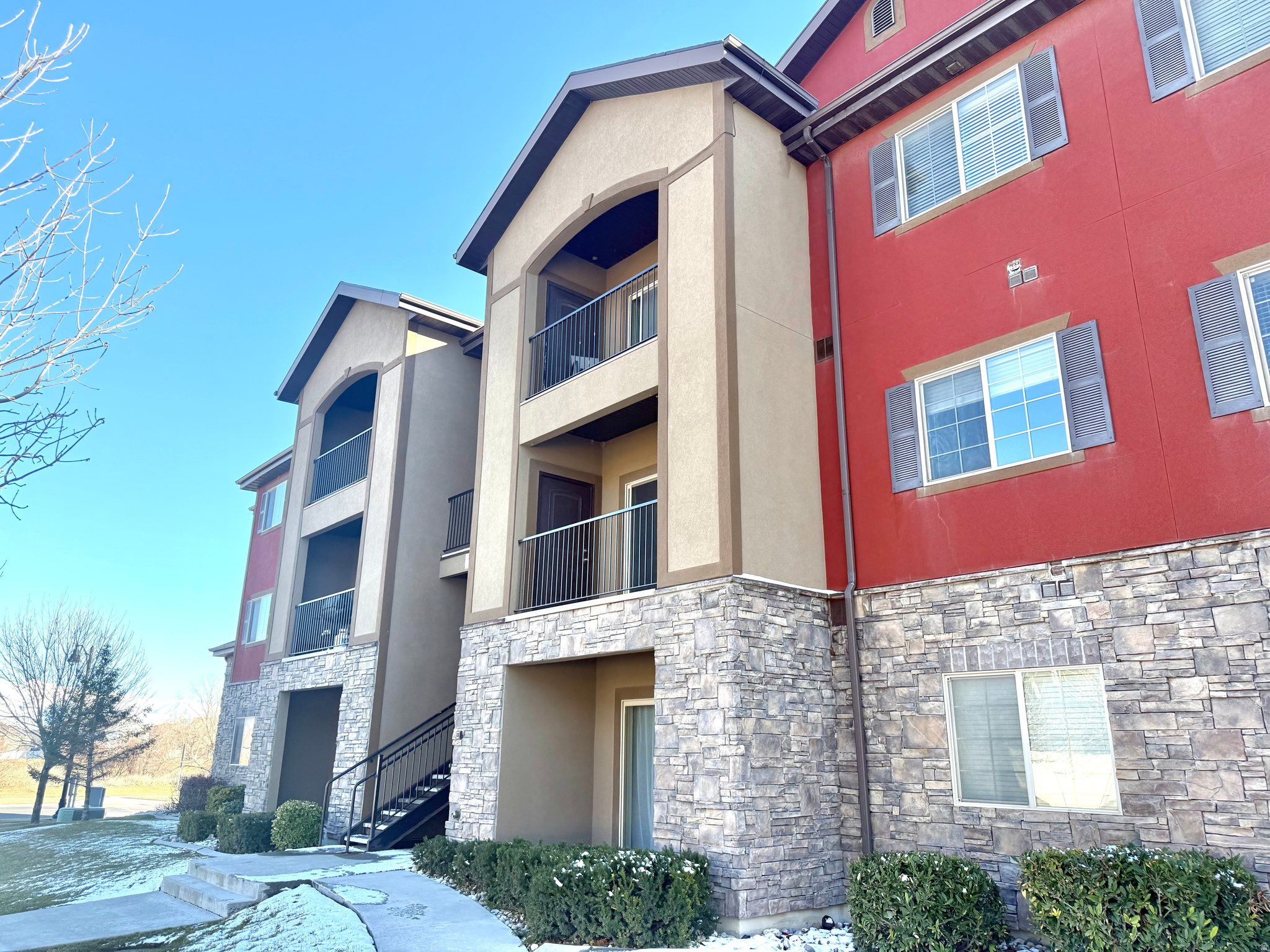 Enjoy mountain views and low-maintenance living in this inviting third-floor condo. Vaulted ceilings create a bright, open feel, while the spacious balcony provides the perfect place to relax and includes an additional storage closet.  The property also features a private two-car garage with room for extra storage, ample guest parking, a Nest doorbell, and well-lit walkways. Conveniently located within walking distance of VASA Fitness, Home Depot, restaurants, shopping, and other everyday amenities, while still tucked away in a peaceful neighborhood.  The pet-friendly community allows up to two dogs or cats weighing 45 pounds or less. The affordable $225 monthly HOA fee covers water, sewer, landscaping, exterior maintenance, and snow removal.