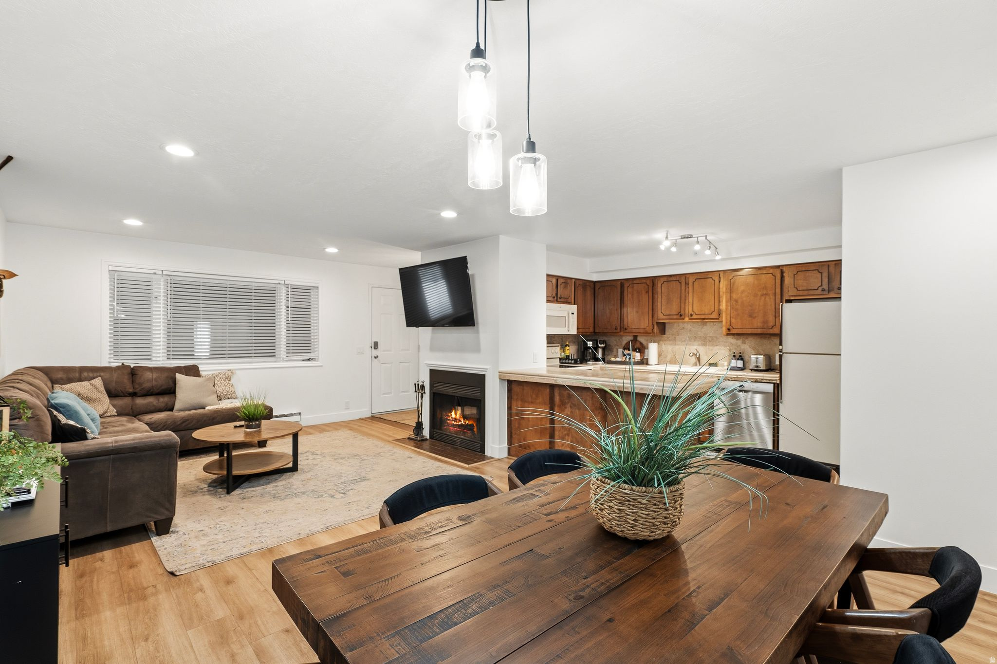 Experience the quintessential Park City lifestyle in this beautifully maintained, single-level 2-bedroom, 2-bathroom condo. Located in the heart of Prospector Square, this residence offers stunning views of the Park City Mountain Resort ski runs and an unbeatable location for outdoor enthusiasts. Interior Features: Turn-Key Condition: Sold with nice and meticulously cared for furnishings . Cozy Ambiance: Features a warm fireplace, durable tile flooring, and classic tile countertops. Convenience: Single-level floor plan with elevator access and underground parking. Location & Lifestyle: Outdoor Access: Situated directly on the Park City Rails-to-Trails system for immediate hiking and biking. Transportation: Steps from the FREE City Bus route, providing effortless access to Main Street, skiing, and world-class dining. Walkability: Walking distance to local restaurants, shopping centers, and athletic facilities. Amenities & Investment: Amenities: Common area, hot tub, and laundry facilities conveniently located just steps from the unit. Versatility: Nightly rentals are allowed, making this an ideal primary residence, vacation getaway, or investment property. Pet Friendly: Owners are permitted to have pets (with restrictions).