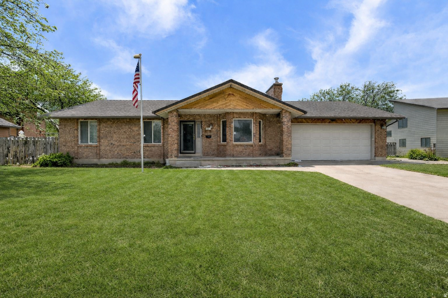 Assumable 3.125% VA loan! Welcome to this beautiful rambler offering space, versatility, and stunning mountain views from both the front and back of the property. This home has been thoughtfully expanded to increase the size of both the main level and the basement, creating a comfortable and functional layout with 4 bedrooms and 3 fully updated bathrooms. The main level features an inviting kitchen with granite countertops, a formal living area, an oversized living room open to the dining room and kitchen, 3 bedrooms, and 2 bathrooms. The primary bedroom offers private access to the new Trex deck, where you can relax and enjoy the fully fenced backyard and serene surroundings. Downstairs, the expanded basement provides exceptional flexibility. Two former bedrooms have been combined into one spacious bedroom with a walk-in closet, while the standout dance room features wood floors and a mirrored wall- ideal for a dance or fitness studio, recreation room, bedroom, mother-in-law suite, or ultimate man cave. There's also a rec room, flex room, bathroom, laundry room and unfinished space for additional bedrooms in the basement. Major updates provide peace of mind, including a new HVAC system, new electrical panel, a leaf guard system, and roof de-icing cables to prevent ice and snow build up on the roof.