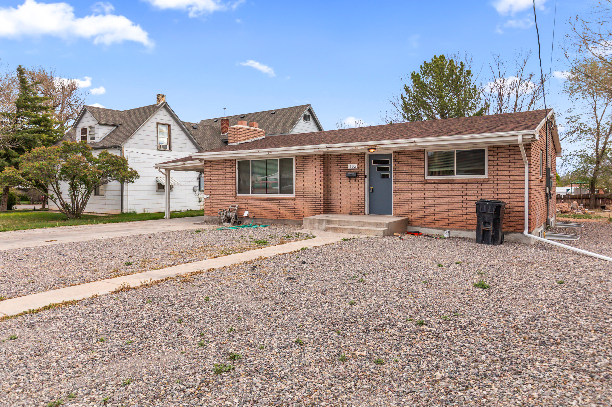 Welcome to 180 East 300 North in Richfield, Utah! Extensively renovated Richfield home with an approved internal accessory dwelling unit in the basement. The main level features 2 bedrooms, 1 bathroom, large living room, kitchen, dining, and laundry. The basement ADU has its own separate entrance with 2 bedrooms, 1 bathroom, kitchen, dining, and living room. Currently rented for $1,190/month. City-approved internal ADU as long as the owner occupies the main level. Great house hack opportunity with mature trees and a central Richfield location.  Square footage figures are provided as a courtesy. Buyer is advised to obtain an independent measurement.