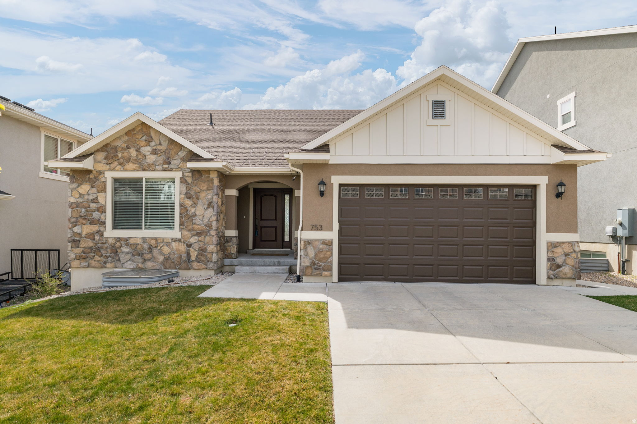 Located in the Canyon Hills neighborhood of Traverse Mountain, this fully finished home offers both comfort and convenience. With 4 bedrooms and 3 bathrooms, there's plenty of space for everyday living and entertaining. Enjoy beautiful mountain and valley views from the large covered deck just off the family room, complete with private access from the primary bedroom-perfect for relaxing mornings or evening sunsets. The walkout basement features a secondary kitchenette, providing added flexibility. Conveniently located near top-rated schools, grocery stores, restaurants, and shopping, you'll love calling this home!
