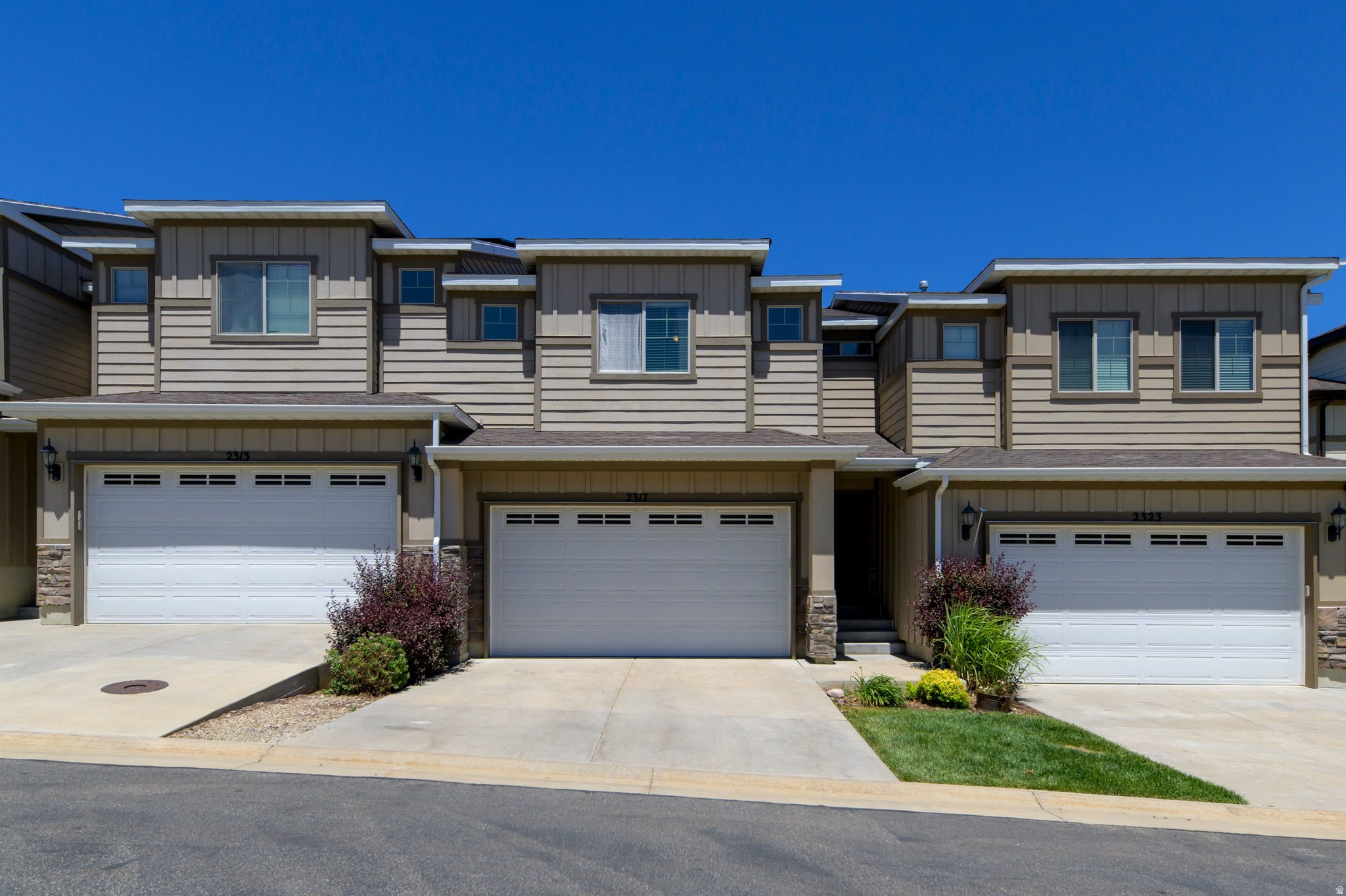 Nestled in the heart of the vibrant SunCrest Mountain Community, this beautifully maintained 3-bedroom, 2.5-bathroom townhome offers stunning mountain views and exceptional living spaces throughout. Step outside to the expansive custom deck, the perfect place to relax, entertain, and take in the breathtaking scenery. Inside, you'll find a thoughtfully designed floor plan with comfortable living areas and modern conveniences. The fully finished walkout basement includes a spacious family room, bathroom, and a large custom storage closet, creating a versatile space that can easily serve as a recreation room, guest suite, home office, or potential fourth bedroom. Recent upgrades provide added comfort and peace of mind, including a new refrigerator, water heater, and water softener (all installed in 2025). Enjoy mountain-community living at its finest with easy access to outdoor recreation, neighborhood amenities, and all that SunCrest has to offer. This incredible townhome is located just minutes from I-15, yet it feels like a mountain retreat!