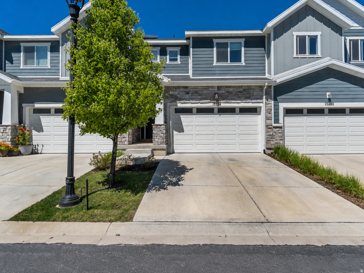 Brand New Carpet! Beautiful Bluffdale townhome with a clean, modern layout and a convenient location. The main level features an open kitchen, dining, and family room area with great natural light, white cabinetry, stainless steel appliances, a large island, and durable hard-surface flooring. Upstairs offers spacious bedrooms, convenient laundry, and well-designed bathrooms. Basement has a finished bedroom, family room, and an unfinished bathroom. Enjoy a private fenced patio, attached garage, and low-maintenance living near schools, parks, shopping, and freeway access!