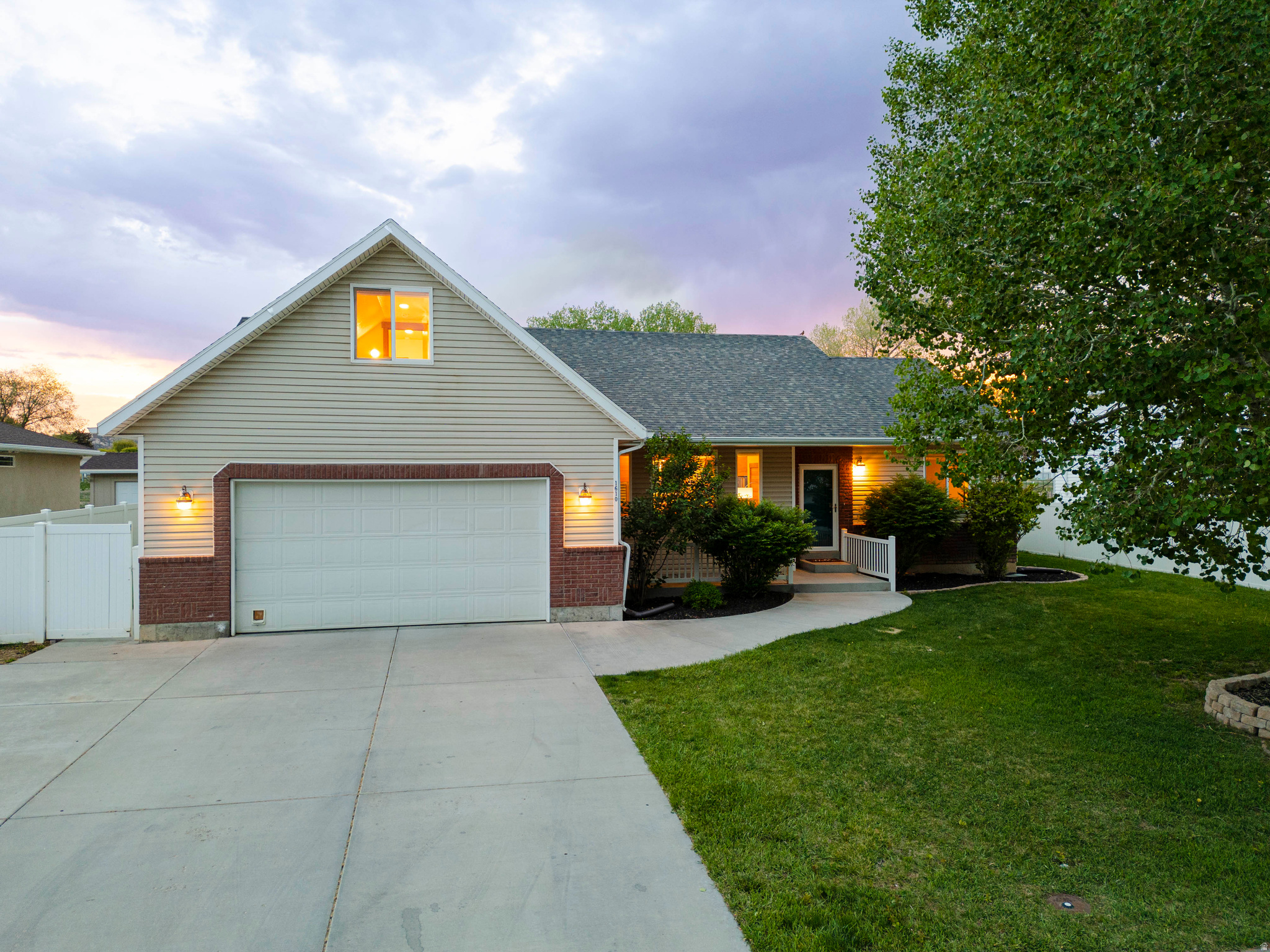 This home was renovated as a personal forever home by an owner with a professional background in residential design and construction - then life took a different turn. Your gain.  From the moment you walk in, you'll notice this is not a typical Vernal renovation. Every surface was chosen to be beautiful and effortless to maintain - flush doors, push-open cabinets, smooth easy-clean finishes throughout. The kitchen will stop you in your tracks: a large island with prep sink and seating, a Sharp Alexa-enabled convection microwave drawer, double drawer dishwasher, two-zone beverage cooler, culinary ice maker, workstation sink, convection range with induction heat, and a Magic Corner pull-out - all flowing openly into the dining and living areas under soaring vaulted ceilings with exposed wood beam. Every lower cabinet is drawers, not doors. Nothing to dig through. Everything at your fingertips.  The primary suite is a genuine retreat. The walk-in closet features custom built-ins, shoe racks, jewelry drawer, pants hanger system, suitcase nooks, and a valet hook. Outside, the covered composite deck faces a canal with open space and mountain and red rock views beyond - the kind of backyard you will actually live in. Fully fenced, programmable sprinklers, raspberry patch, and an in-ground trampoline already installed. The garage includes a workbench, full shelving, extra refrigerator-freezer, and smart opener you can check from anywhere. Minutes from Flaming Gorge National Recreation Area, Dinosaur National Monument, and Red Fleet State Park, with daily direct flights to Denver and Phoenix from Vernal Regional Airport.  A dedicated paved trail connects the neighborhood to Discovery Elementary, Vernal's top-ranked elementary school. No HOA. Move in this summer. Call or text Bethany at 435-621-1072. All information deemed reliable; buyer advised to verify independently.