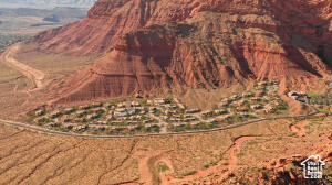 A unique opportunity awaits to become a foundational member of Sentierre, Southern Utah's most exclusive resort community. This .32-acre homesite, Lot 7, is available for $775,000 as a build job for a single-family villa, complete with 2 lock-offs. Nestled against the backdrop of majestic Padre Canyon, this property ensures your connection to nature and a future of uncompromised views. The exquisite ''Senda'' floor plan is an available option for this lot, based on the grading. Sentierre is not just a place to live; it's a philosophy you can live in, centered on holistic wellbeing and a vision for an intentional life. Secure your legacy in a community with world-class amenities and a commitment to endure.  You may bring your own builder, which must obtain development approval.