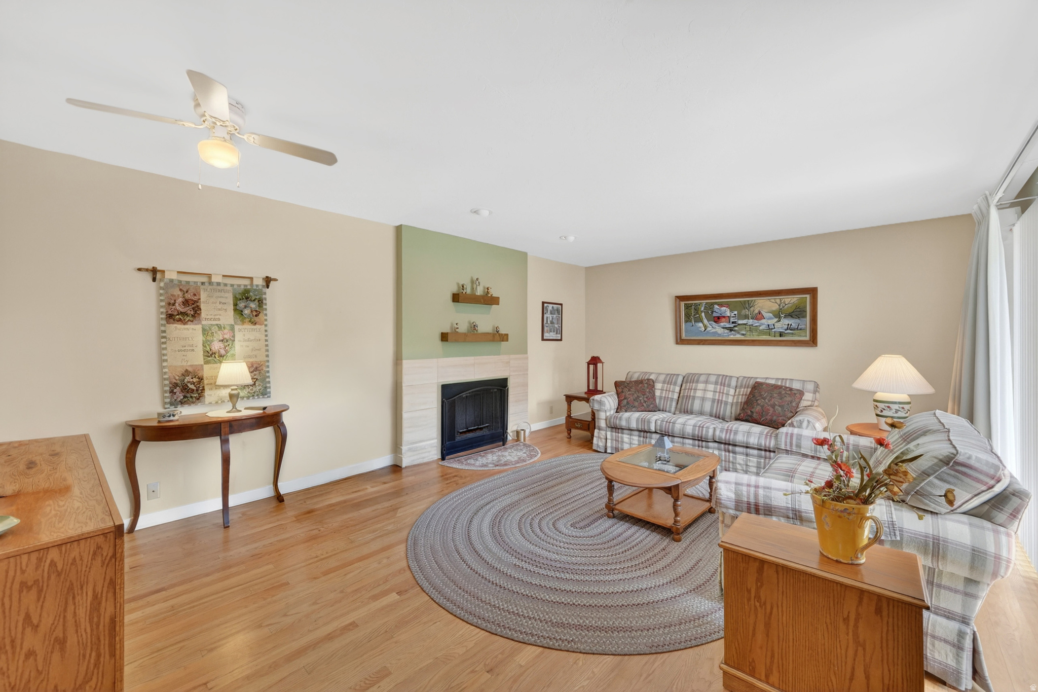 Meticulously maintained and truly turn-key, this beautifully updated condo reflects exceptional pride of ownership throughout. Rich oak flooring installed in 2018 replaced the original vinyl flooring, adding warmth and timeless appeal to the main living areas. The kitchen was thoughtfully renovated and freshly painted in 2025, creating a bright and inviting space that is both stylish and functional. New sliding glass patio doors were installed in apx. 2024, enhancing energy efficiency and bringing in abundant natural light. Every detail has been carefully cared for, making this home ready for its next owner to move right in and enjoy. Both bathrooms are equipped with grab bars, providing added convenience and accessibility. The private patio is clean, neat, and surrounded by mature landscaping, offering a peaceful outdoor retreat with beautiful mountain views. An attached two-car garage provides exceptional convenience and generous storage. Situated in a quiet, well-maintained community with desirable pool and clubhouse amenities, this home offers both comfort and lifestyle. Ideally located just minutes from 900 East, Fort Union shopping and dining, I-215, and I-15, with convenient access to Alta, Brighton, Snowbird, and Park City. This is a rare opportunity to own a thoughtfully updated, impeccably maintained home in a highly desirable community.