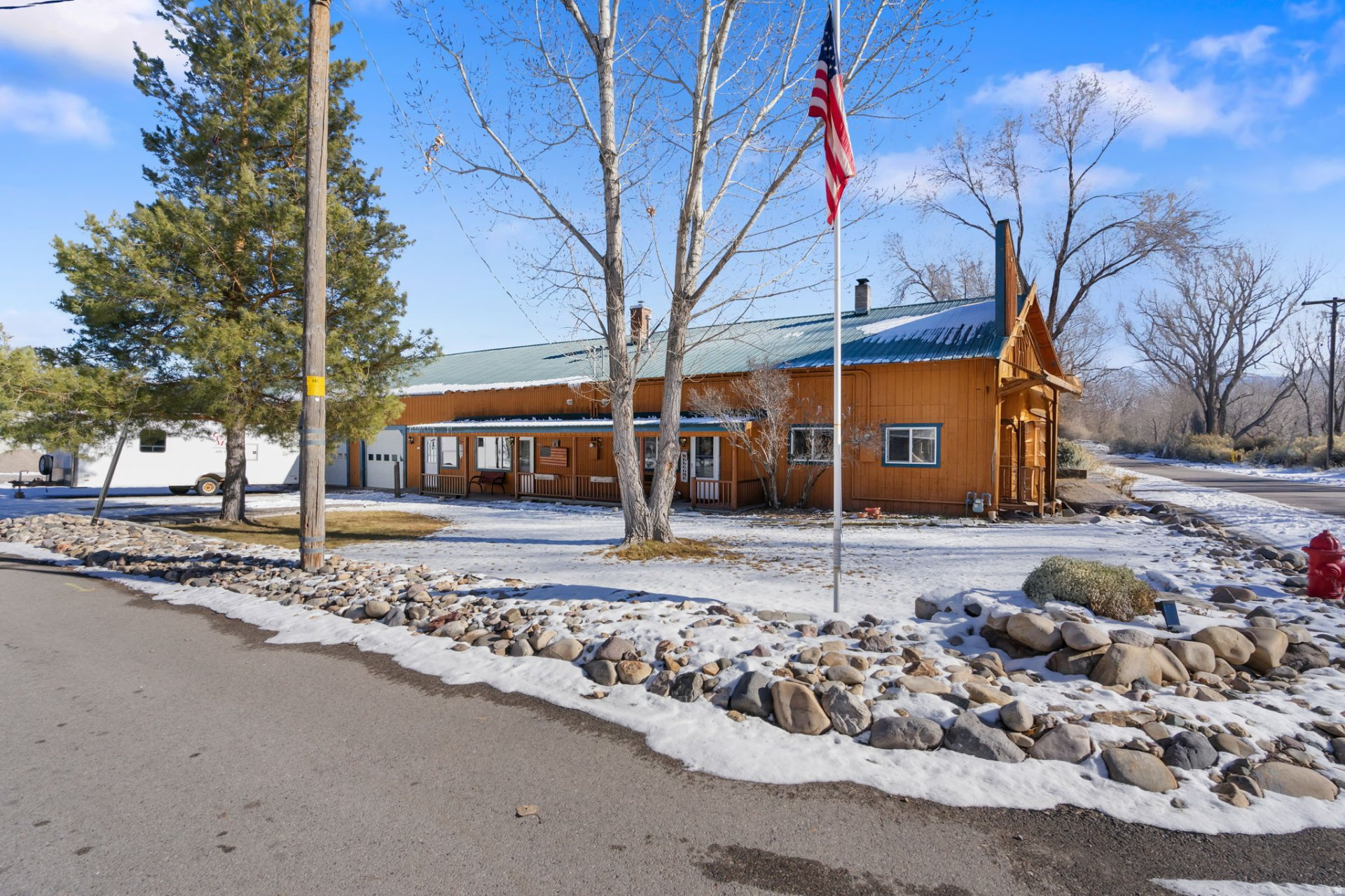 This versatile property has a layout that opens the door to a lot of different possibilities! The main house has 6 bedrooms, 4 full bathrooms, and 2 half bathrooms, with 4111 square feet and two kitchens and two laundry rooms, making it easy to use as two separate living spaces if needed. Attached to the home is a large shop with four separate bays, offering approximately 3,452 square feet of functional workspace-great for storage, projects, or business use. There's also a separate detached building with two individual units. One unit includes a kitchen and bathroom, and the second unit has a bathroom, creating great potential for guest space, rental income, or flexible use. If you're looking for a property with space, flexibility, and real income potential, this one checks all the boxes! Year built is unknown and taxes to be determined.