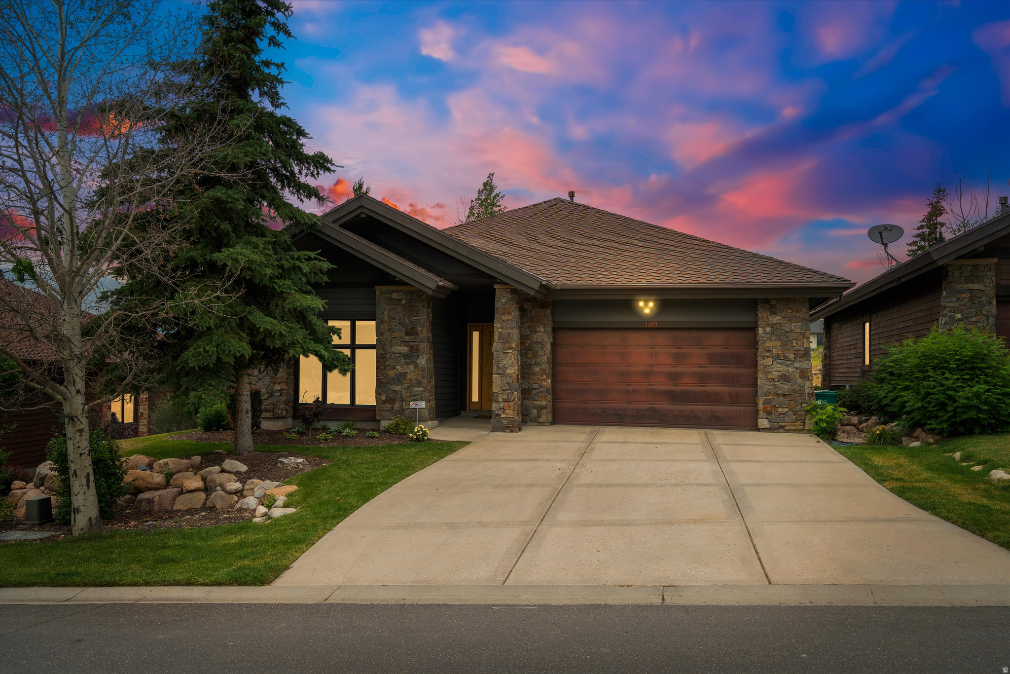 Whether you're seeking a primary residence, mountain getaway, or investment property, this immaculate single-level home in The Fairways offers the best of Ogden Valley living. Sold furnished and complete with a golf cart, this home is move-in ready for your mountain lifestyle. Vaulted ceilings, oversized windows, and an open floor plan fill the home with natural light and showcase stunning mountain views, with Wolf Creek Golf Course's 16th hole just steps away. Quality finishes include quartz countertops, solid alder cabinetry, Madrone hardwood floors, a smart thermostat, and a beautiful stone fireplace. The spacious primary suite features patio access, a walk-in closet, and a luxurious ensuite with dual sinks, a jetted tub, and a glass-enclosed shower. Surrounded by professionally landscaped grounds, the private patio is the perfect place to relax and enjoy frequent wildlife sightings. Community amenities include a pool, spa, fitness room, clubhouse, and tennis courts. Ideally located near Snowbasin Resort, Nordic Valley Ski Resort, and Pineview Reservoir and just 8 minutes from Powder Mountain (with a free shuttle out your doorstep) this home offers year-round recreation in one of Ogden Valley's most desirable communities. Zoned for short-term rentals, it's also a compelling option for investment buyers. Square footage figures are provided as a courtesy estimate only. Buyer is advised to obtain an independent measurement.