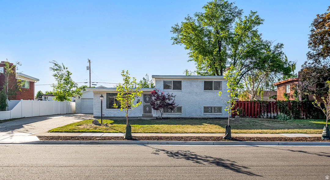 Come see this beautifully remodeled home on a quiet street in the heart of Murray! This home has been meticulously cared for and includes many upgrades made by the current owner. Newer kitchens and baths, new carpet throughout, new high-efficiency furnace and central air conditioning, new PEX supply lines, and new black iron gas lines are installed in the home. The spacious back yard is fully fenced for doggos and kiddos. An oversized 2 car detached garage provides plenty of space for storage, tools, and recreation equipment. Square footage is based on a pervious listing, buyer to verify all information.