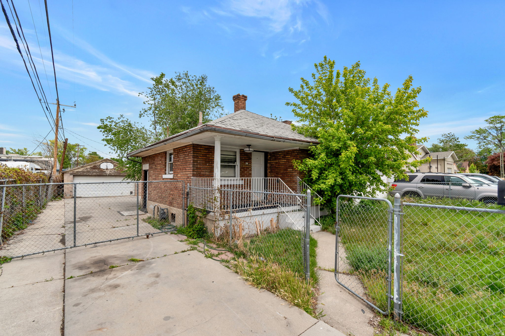 Multiple offers received. Highest and best due on Friday, May 15, by 3:00 pm. Come make this bungalow your own. It's a haven of potential, located in a peaceful Midvale neighborhood. Imagine evenings in the inviting living space or hosting gatherings in the spacious backyard. It's a blank canvas that's priced right and ready for your personal touch. This unique property boasts a 342 sq ft room in the garage, perfect for a home office, and, for the hobbyist or DIY enthusiast, a 500 sq ft 2-car garage complete with a workshop area and an RV pad for your toys. Beyond the home's walls, convenience is at your doorstep. Just minutes away, you'll find a variety of stores and restaurants offering the best of both worlds. The expansive yard, adorned with mature trees, provides space to enjoy the outdoors. Picture summer barbecues, children playing, or simply relaxing. It's a home to create lasting memories. Sq footage provided as a courtesy estimate and was obtained from county records. Buyer is advised to obtain an independent measurement.