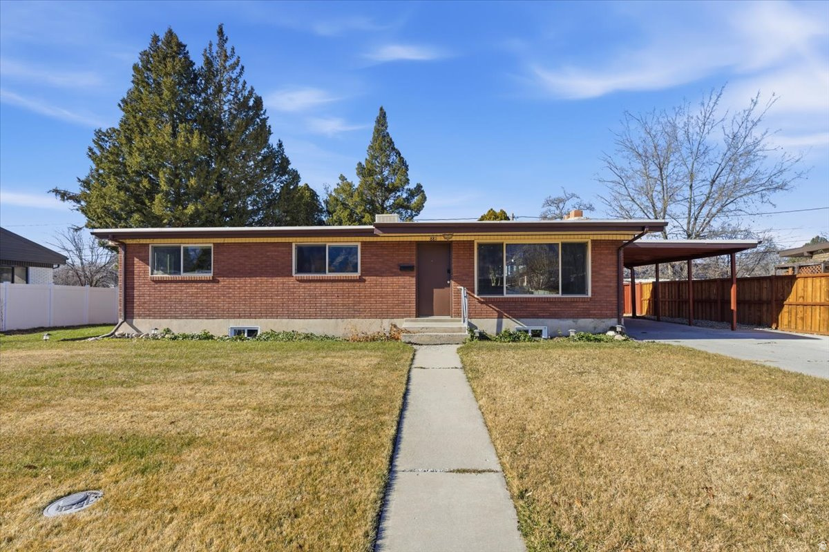 This home is in great condition and features a brand-new kitchen completed in June 2025 with new cabinets, appliances, light fixtures, and fresh paint. The cozy living room is filled with natural light from a large window and anchored by a charming brick fireplace, creating a warm and inviting space. The main bathroom has been remodeled with a tile shower and glass door, adding a clean, modern feel.  Downstairs, the basement is mostly unfinished, offering excellent potential to expand and customize to your needs, with two partially finished bedrooms already in place. Major systems have been thoughtfully updated, including a new insulated roof installed in April with a 50-year warranty, a furnace and water heater replaced in 2022, and a swamp cooler that has been serviced and is in good working condition. The exterior continues to impress with new sod installed last summer, new basement windows by Jones Paint & Glass, and a detached one-car garage plus a carport for additional parking. Enjoy mountain views of the iconic "Y", adding to the home's charm and setting. Square footage obtained from County Records. Buyer is advised to verify all information.