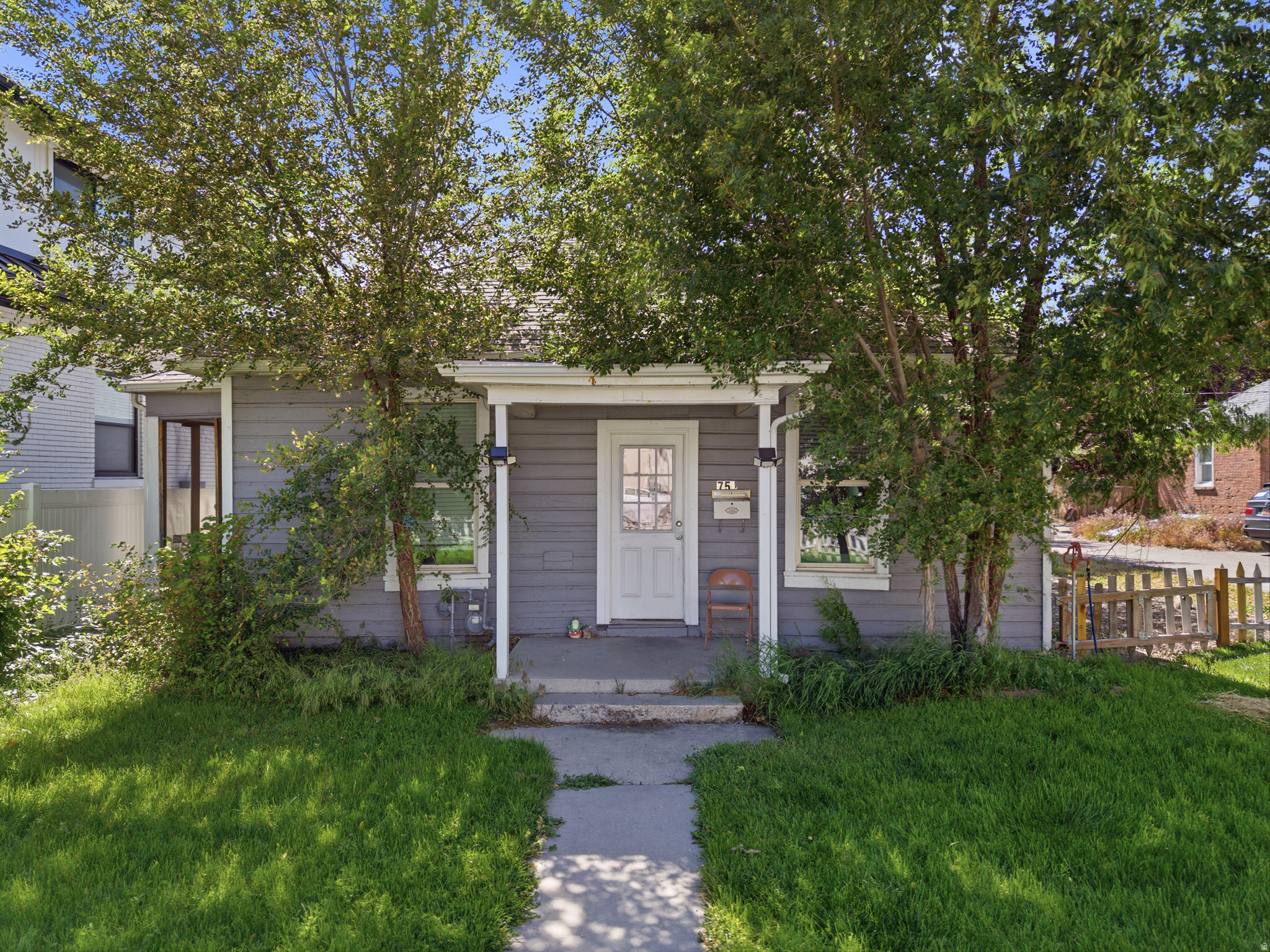 Rare investment opportunity in a prime Provo location! Built in 1890, this charming home is full of vintage character and offers tremendous potential as an investment property or future owner-occupied residence. Zoned "Downtown Gateway" (GW) and NIGHTLY RENTAL APPROVED ZONE (Airbnb) lending to exceptional income-producing potential and redevelopment opportunities as both residential and commercial! This 3-bedroom, 1-bathroom home features hardwood floors, high ceilings, and a garage, all sitting on a large lot just minutes from the Provo Convention Center, NuSkin, BYU, freeway access, shopping, dining, and entertainment.  Enjoy the local farmers market on summer weekends. The lot benefits from additional access via a recorded right-of-way easement and features a recently upgraded sewer line sized to serve multiple units, providing added flexibility for future development or expansion.  The rear portion of the lot is accessible by car, lending to many potential uses.  Whether you're seeking a cash-flowing rental, a redevelopment project, or a home with long-term upside in one of Pro vo's most desirable locations, this property presents a unique opportunity. Property is currently tenant-occupied-lease ending June 2027. Please do not disturb tenants or trespass on the property or adjacent property, including the private drive. All showings are by appointment only and must be accompanied by the listing agent.  Property is sold as-is. Buyer to verify all information provided. Also for sale 80 N 700 W, Provo, UT MLS # 2161741 (SF home and duplex)