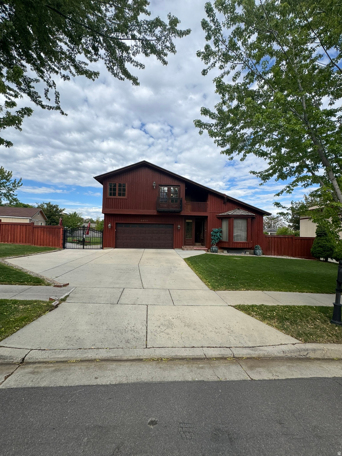 Open House Saturday and Sunday 10am - 2pm!!! Nestled in the prestigious Raintree neighborhood on Sandy's desirable east bench, this stunning estate offers luxury living in an unbeatable location. Just minutes from world-class ski resorts, breathtaking hiking and biking trails, and endless year-round recreation, this home truly has it all. Situated on one of the largest lots in the area, the property combines exceptional craftsmanship with outstanding comfort and style. Inside, you'll find exquisite custom woodwork throughout, soaring vaulted ceilings, and expansive formal living and entertaining spaces filled with natural light. The thoughtfully designed floor plan also offers the potential for a mother-in-law apartment. Step into your own private backyard retreat featuring a heated swimming pool, relaxing hot tub, and a beautifully landscaped, fully fenced yard with plenty of space to entertain, play, or unwind in complete privacy. This is a rare opportunity to own one of the most impressive homes in one of Sandy's most sought-after neighborhoods.   Square footage figures are provided as a courtesy estimate only and were obtained from personal measurement.  Buyer is advised to obtain an independent measurement.