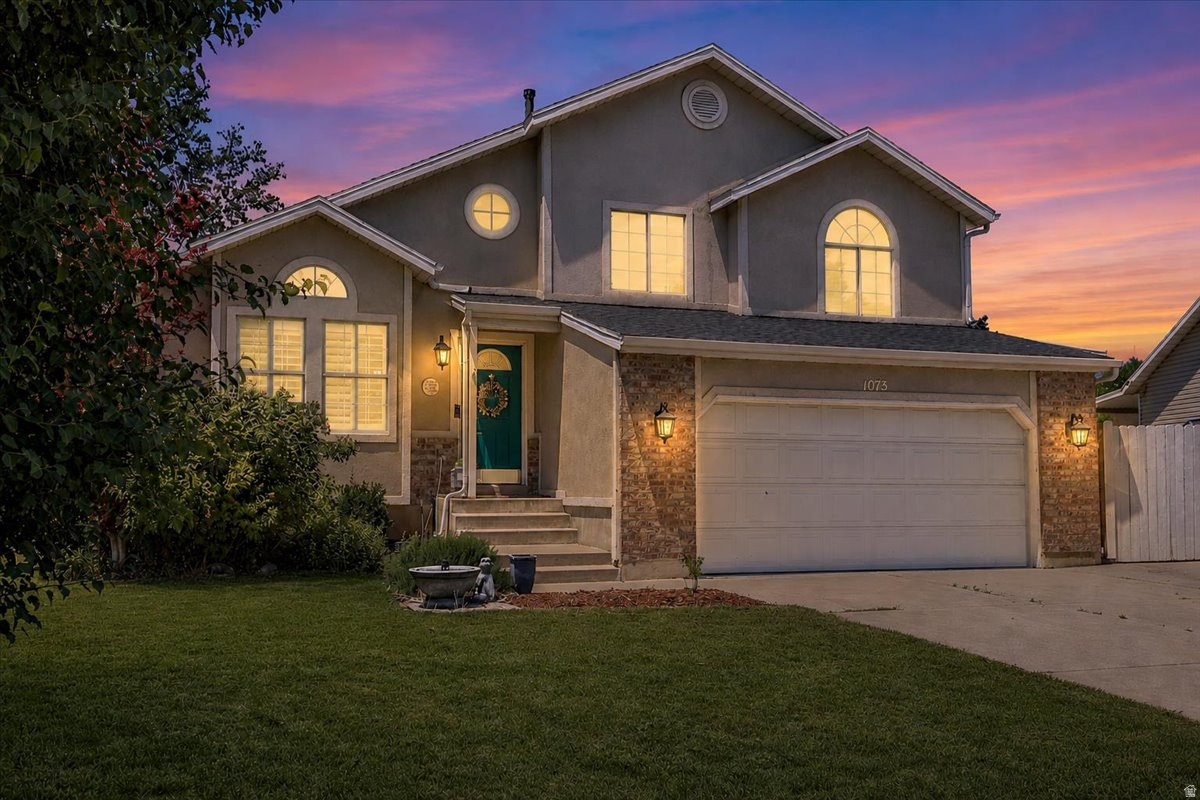 Home beautifully updated and move-in ready! Conveniently located in Layton with quick freeway access and just minutes from shopping, dining, parks, schools, and Hill Air Force Base. This home features a fully remodeled open-concept kitchen with custom cabinetry, updated countertops, granite and quartz, an upgraded gas stove, and a chef-style range hood. Recent updates include a new roof (2021), new central A/C (2025), waterproof LVP flooring throughout, fresh interior paint, remodeled bathrooms with custom tile, updated fireplace, and plantation shutters throughout. With modern finishes, major system updates, and an unbeatable location, this home is one you won't want to miss!  Square footage figures are provided as a courtesy estimate only and were obtained from previous listing.  Buyer is advised to obtain an independent measurement.
