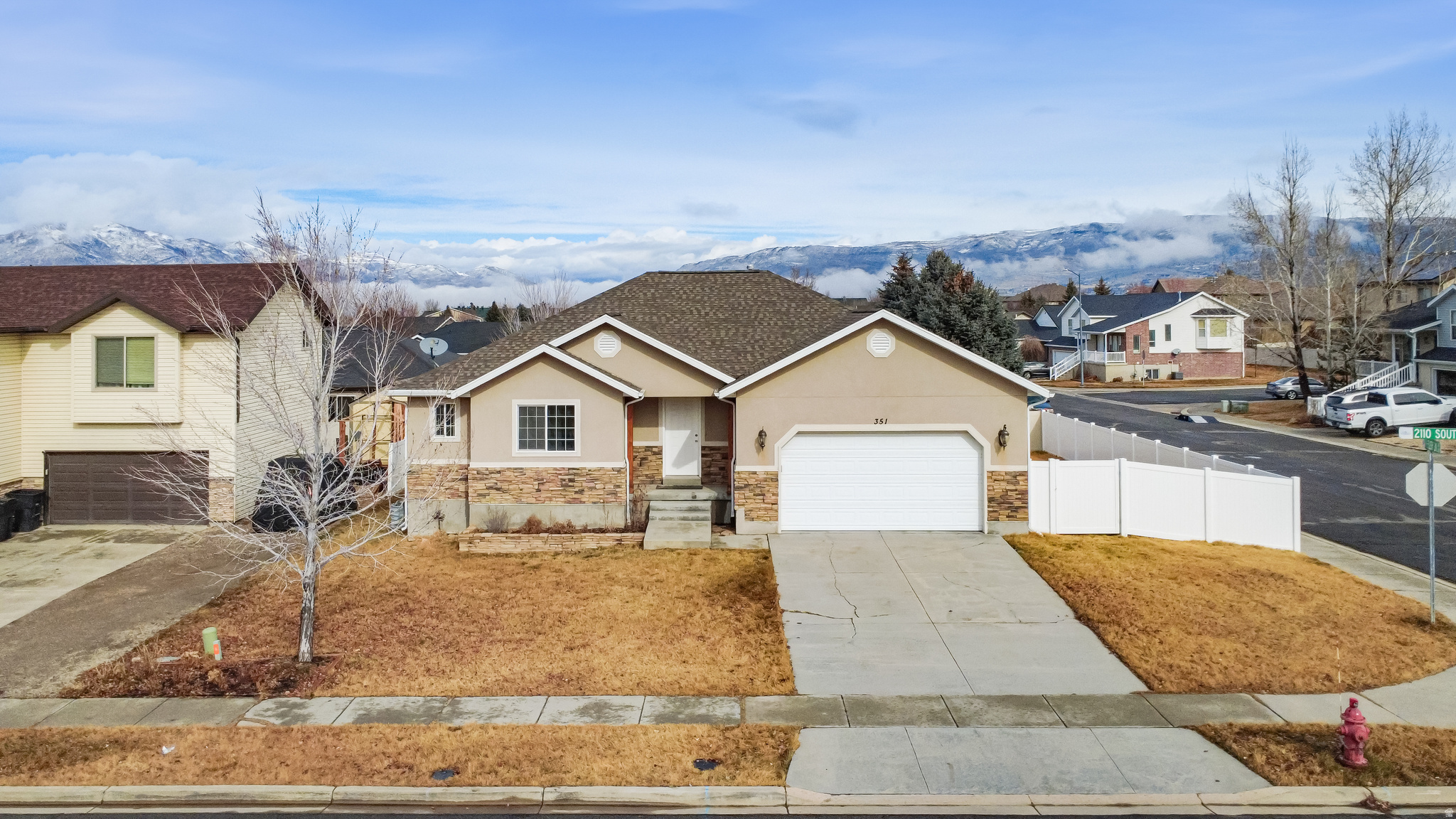 Welcome to 351 E 2110 S in beautiful Heber City! This spacious 6-bedroom home offers the perfect blend of comfort, convenience, and location. Nestled in a quiet neighborhood right next to a scenic community park, you'll love having open green space and playgrounds just steps from your front door. Inside, you'll find a bright and inviting floor plan featuring brand-new paint and carpet throughout, giving the entire home a fresh, move-in-ready feel. With generous living spaces, a modern open-concept layout, and plenty of room for family, guests, or a home office, this home is ready to fit your lifestyle. Enjoy all that Heber has to offer-nearby schools, local shops, and endless outdoor recreation just minutes away. Don't miss this rare find combining size, style, and location in one perfect package! Sellers are related to selling agent.