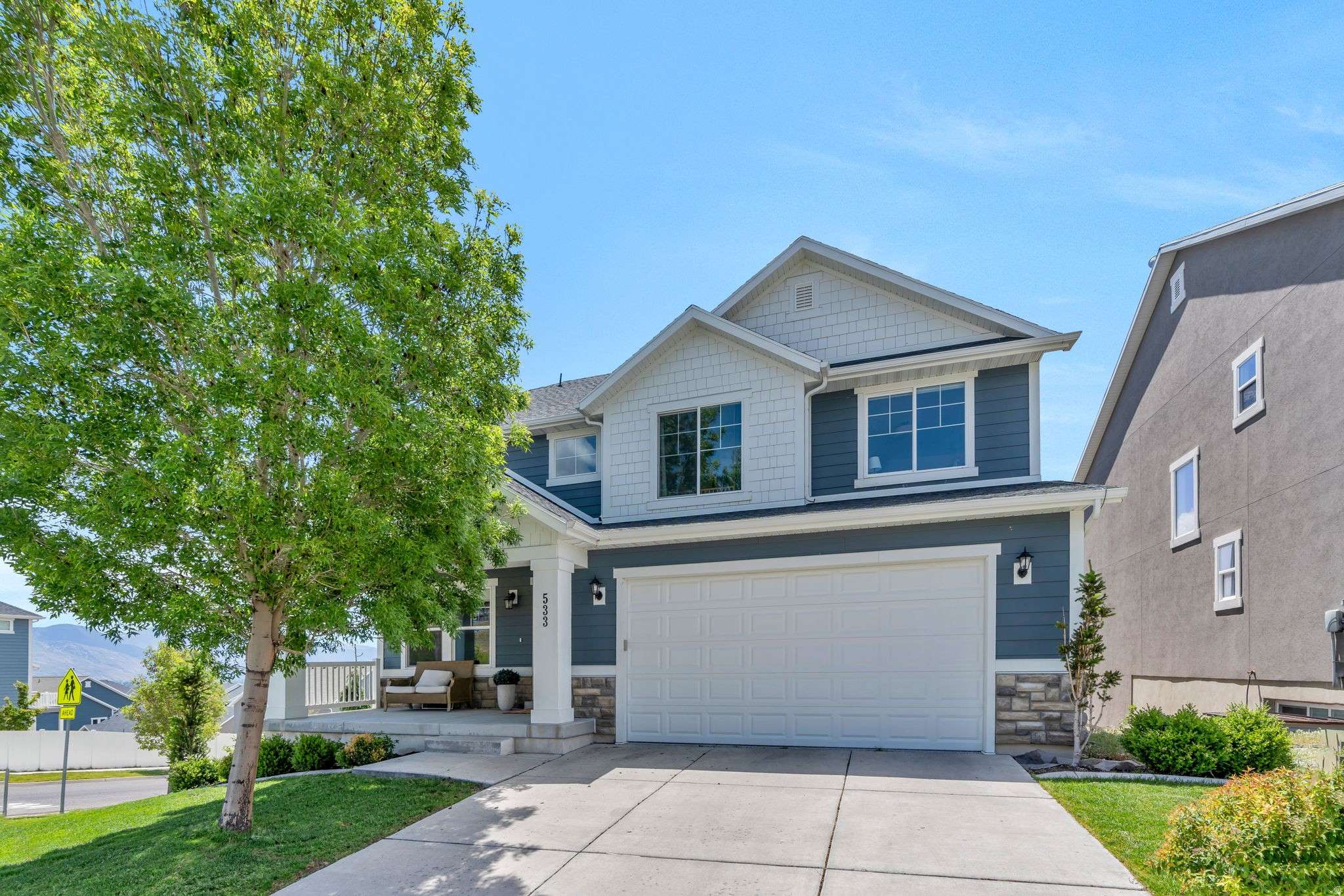 OPEN HOUSE: 12-3pm on Saturday May 30th --- Welcome to one of the most sought-after neighborhoods in Lehi! This incredible home features breathtaking, unobstructed mountain and valley views from every level - views you'll never get tired of waking up to. Directly across the street, enjoy the community pool, tennis courts, basketball court, and park, giving you the feeling of having your own private resort right outside your front door. Inside, the main floor is filled with natural light and designed for both everyday living and entertaining. The stunning kitchen opens to a spacious great room with soaring vaulted ceilings, oversized windows, and picturesque views in every direction. The main level also features a private office and a spacious walk-in laundry room as well as a beautiful balcony where you can barbecue and enjoy the sunset!   Upstairs, you'll find 4 bedrooms, including a peaceful primary suite with its own private bathroom and walk-in closet, plus 3 additional bedrooms and a full bathroom.  The walkout basement is bright, open, and incredibly versatile...featuring a large bedroom, full bathroom, and cold storage, making it the perfect space for guests, a second living area, home gym, or movie room.  With unbeatable views, incredible natural light, and resort-style amenities just steps away, this is the kind of home your family will love for years to come.