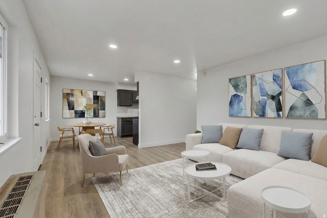 Well-maintained, updated, and affordably priced, this 2-bedroom condo sits just minutes from downtown Salt Lake City. Recently refreshed with brand-new flooring, new windows, recessed lighting, and a clean, modern feel throughout. Located in a gated, pet-friendly community with covered parking and investor-friendly flexibility, it offers strong rental appeal and long-term upside. Positioned on the central west side within one mile of the growing Power District, State Fairgrounds, parks, schools, a dog park, shopping, dining, and quick freeway access. An ideal option for commuters, first-time buyers, or investors looking for a smart, budget-friendly property close to the city core.