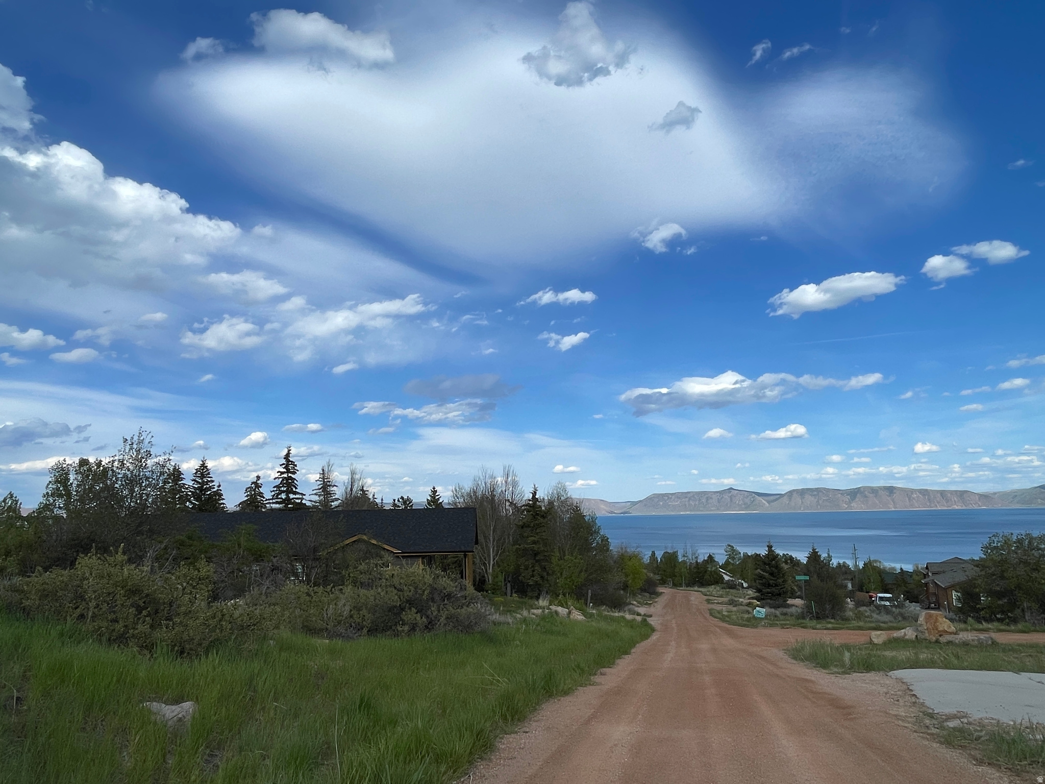 Residential lot in the coveted Bear Lake West community, Fishhaven, Idaho. Lot 92 at 178 Cody Lane offers 0.35 acres boasting exceptional Bear Lake views, mature trees, and access to outstanding community amenities. Whether you're building a vacation retreat or a forever home, this is your opportunity to own a slice of Idaho's most beloved lakeside destination.