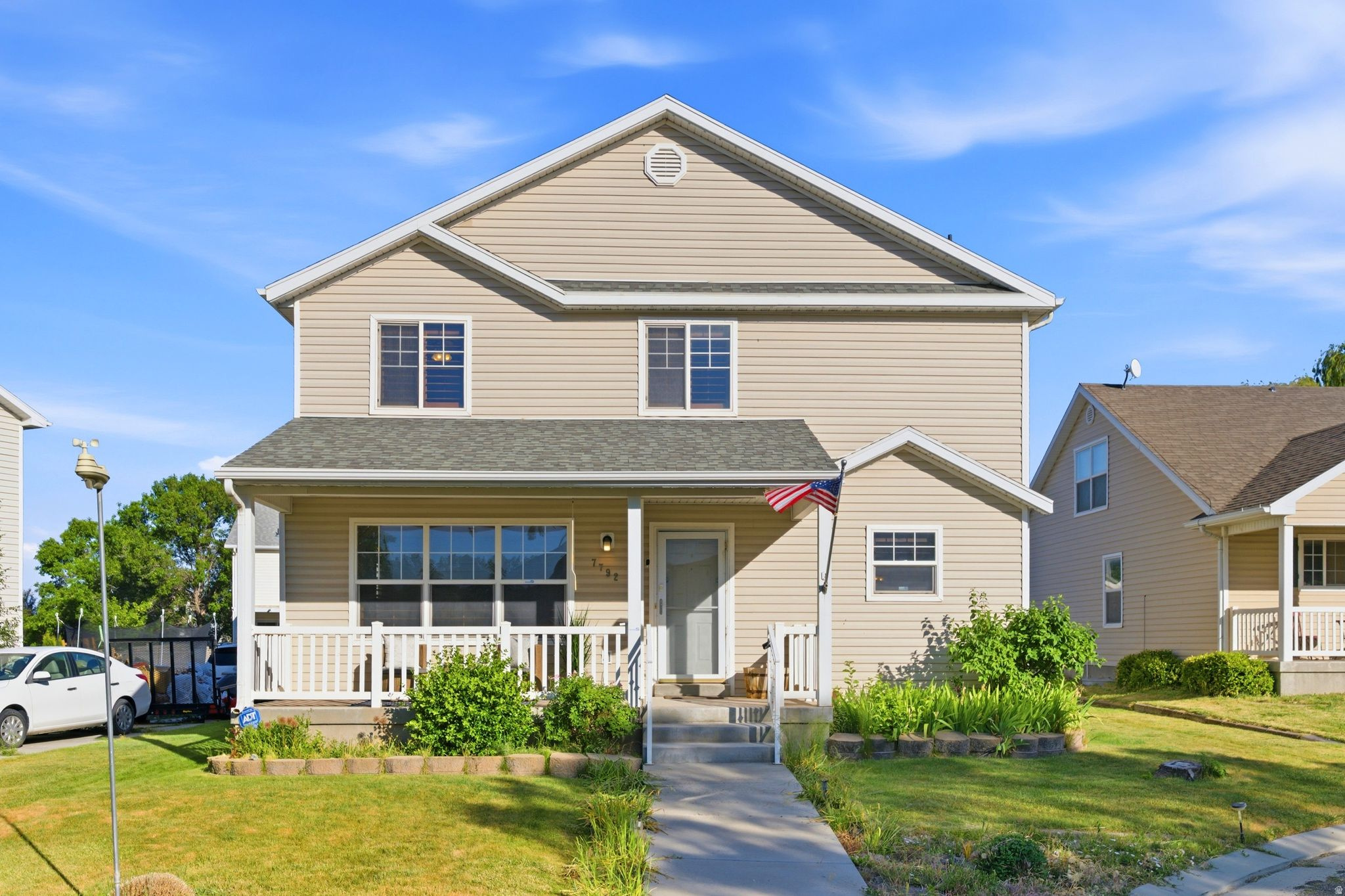 GRAND OPENING! OPEN HOUSE SUNDAY Jun 7, 12-2pm. Welcome to Chimney Rock, the cutest subdivision in the Ranches at Eagle Mountain! Here you'll find quiet, tree-lined streets away from the bustle of town but close to shopping, highways, and all the services you need. This home has room to spare, from the big porch (perfect for sipping summer lemonade) to the spacious main floor living room, open kitchen & dining, and half bath with laundry off your two car garage. Upstairs find 4 bedrooms: 3 with a shared bath, plus a big primary en-suite featuring a walk-in tub and huge walk in closet. The basement has 2 more bedrooms & a full bath... and bonus! Projector and screen in the family room included for cozy movie nights at home. Upgrades galore! You'll love the gorgeous wood laminate flooring, plantation shutters, and beautiful granite kitchen & larvikite bath countertops. Plenty of cold storage too, as well as that roomy garage. New paint & carpet means you are move in ready and NO HOA means no extra fees. Come for a tour... you may never want to leave.