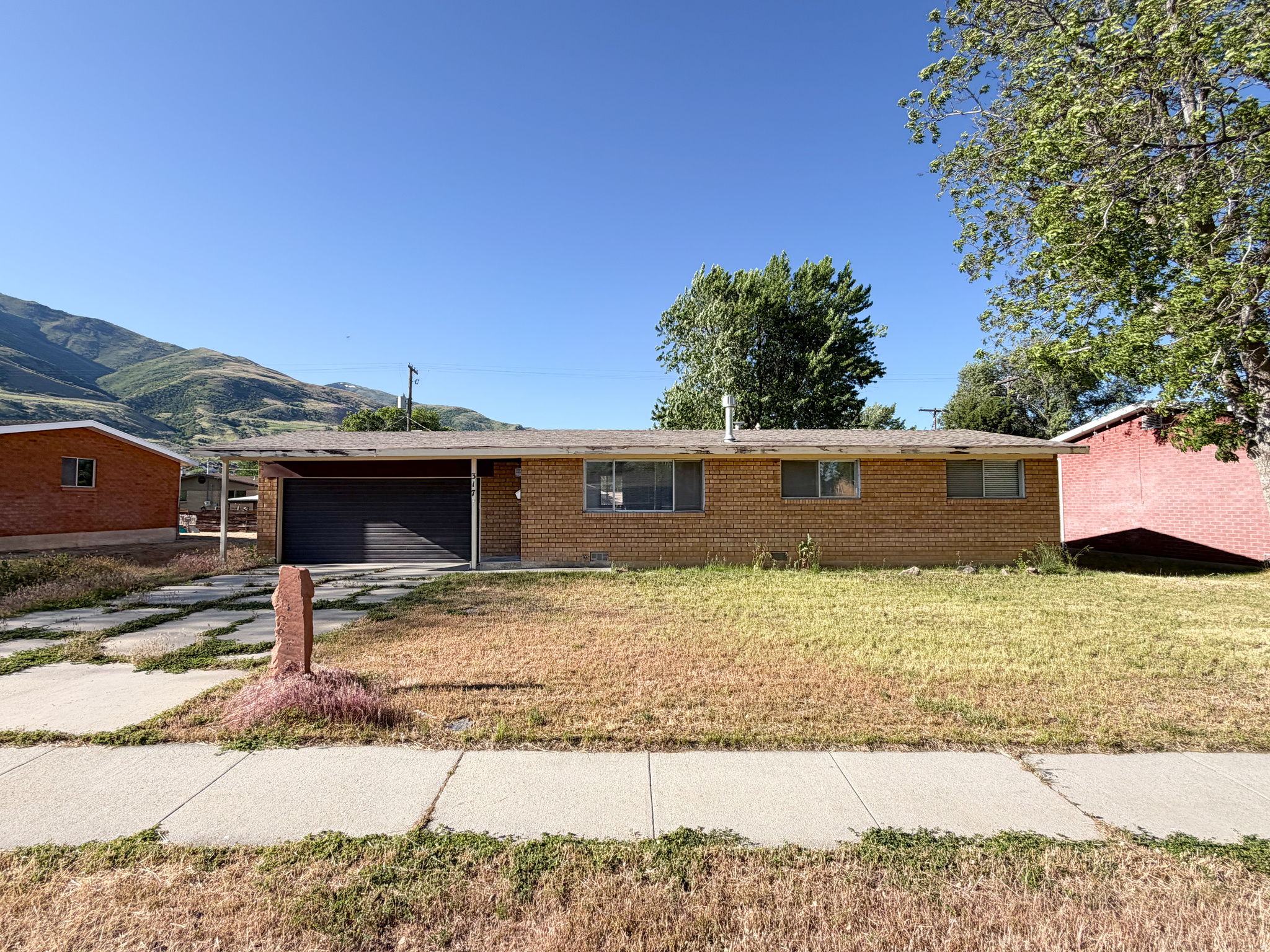 Enjoy easy single-level living in this charming home, nestled in a quiet, established neighborhood. Thoughtfully designed to maximize its space, it features a cozy, inviting layout, a spacious garage for parking and storage, and a convenient location close to shopping, dining, parks, schools, and commuter routes.