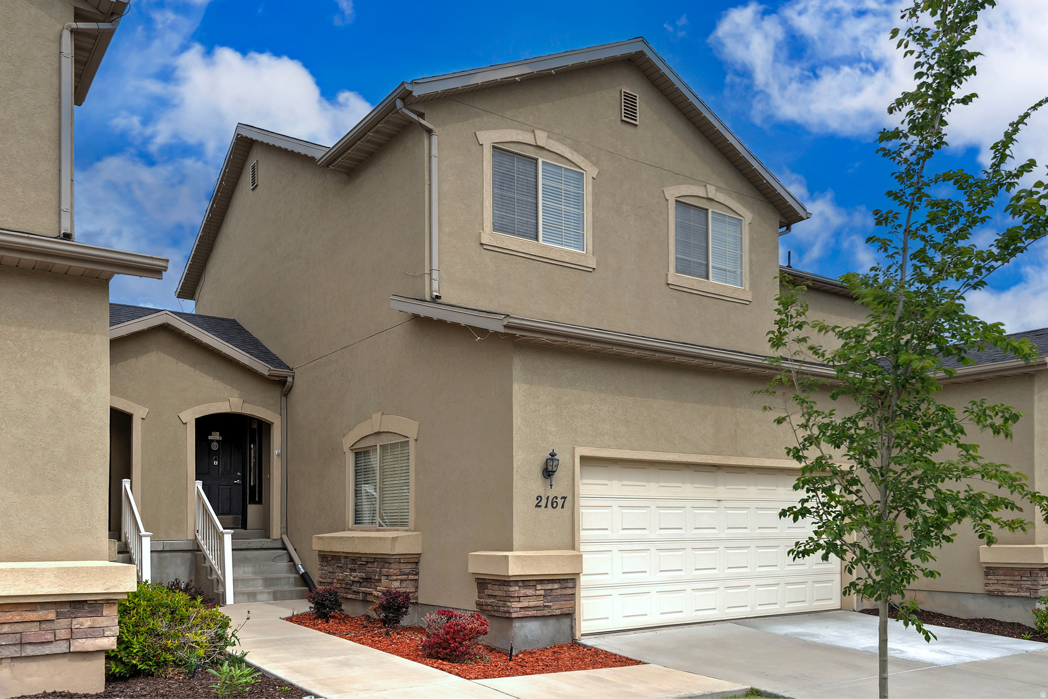 Immaculate and meticulously maintained townhome nestled in the highly sought-after Point Meadows community in Lehi. This inviting home offers a generous, fully fenced, outdoor space and a large two-car garage, combining convenience with curb appeal. Inside, you'll discover a bright and open layout spanning over 1,700 square feet, featuring three bedrooms and four bathrooms that thoughtfully accommodate daily living and guests. The daylight basement fills the lower level with abundant natural light, creating a warm and welcoming ambiance throughout. Don't miss the opportunity to make this pristine residence your own-arrange a showing before it's gone.