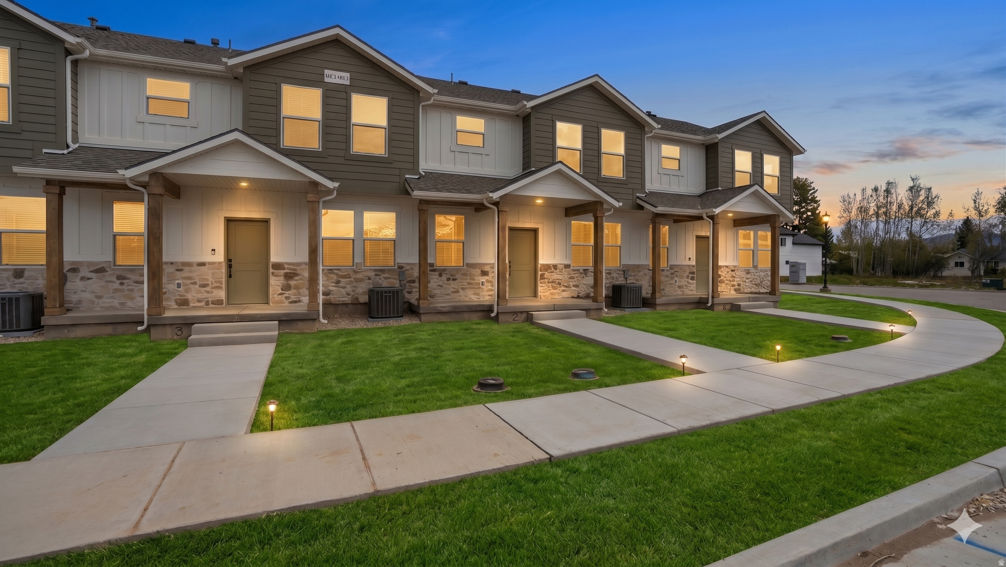 Beautiful new construction townhome in the heart of Morgan! This thoughtfully designed 3-bedroom, 2.5-bath home offers modern living with high-end finishes throughout. Enjoy an open and inviting main level featuring durable LVP flooring, quartz countertops, soft-close cabinetry, a pantry, and a full suite of LG stainless kitchen appliances-including refrigerator, gas range, microwave, and dishwasher. Upstairs, you'll find spacious bedrooms with walk-in closets, plush carpet, ceiling fans, and a convenient laundry room. Bathrooms and laundry areas feature stylish tile flooring, while recessed lighting enhances the bright, contemporary feel throughout the home. Built for comfort and efficiency with a Trane high-efficiency furnace and A/C, plus a 40-gallon water heater. The 2-car garage is prepped for a 50-amp EV charger, adding future-ready convenience. Exterior highlights include durable Hardie board and stone finishes, a covered front porch, and a covered rear entry. Enjoy low-maintenance living with fully landscaped yards and snow removal all handled by the HOA. High-speed fiber optic internet available. Includes builder warranty for added peace of mind. More units are available, contact agent for more information. Taxes are based off of lot only. Sq. footage per plans; Property facts are provided as a courtesy; Buyer to verify all information.