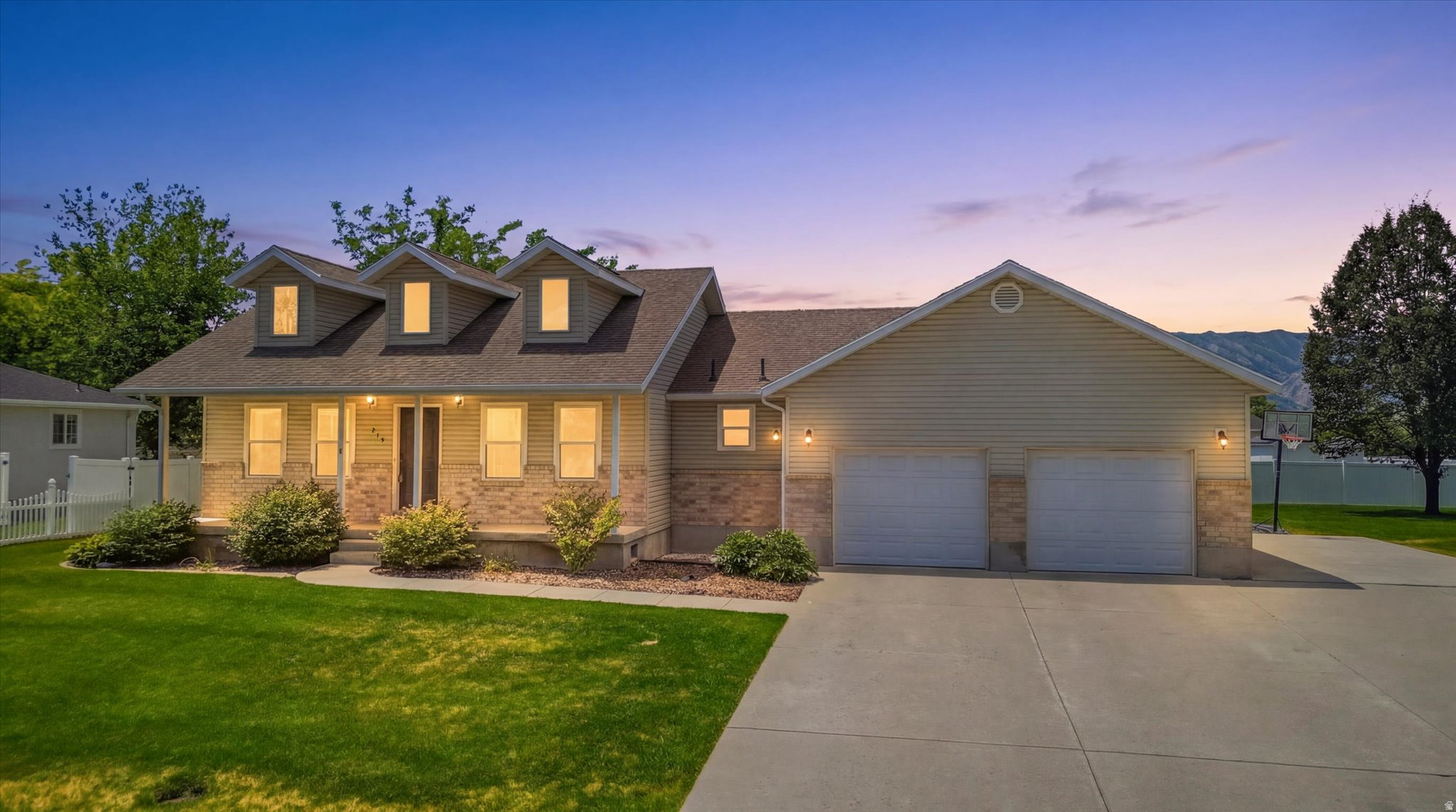 Welcome home to this beautifully updated 4-bedroom, 3-bathroom home situated on a spacious .28-acre lot in desireable Hyrum. Offering the perfect blend of comfort, functionality, and breathtaking mountain views, this move-in-ready home is one you won't want to miss. Recent updates include fresh interior paint, new luxury vinyl plank (LVP) flooring and carpet, new baseboards and door casings, and modern lighting throughout.  All the main level windows were replace in  June 2023, and the water heater was updated the same year for added peace of mind. The spacious primary suite features a beautifully remodeled bathroom completed in 2025, complete with a double vanity, a large walk-in shower, and elegant coutertops. A dedicated den provides flexibile space for a home office, play room, reading room, or home gym. The extra-length 2-car garage offers plenty of space for vehicles, tools, and recreational gear, while the dedicated RV pad provides convenient parking for your RV, trailer, or additional vehicles. A spacious shed and basement storage areas offer even more room to keep everything organized. Step outside to enjoy the fully landscaped yard and take in the stunning views. With thoughtful updates, abundant storage, a spacious gararage, RV parking and an ideal location, this home is ready for it's next owners.