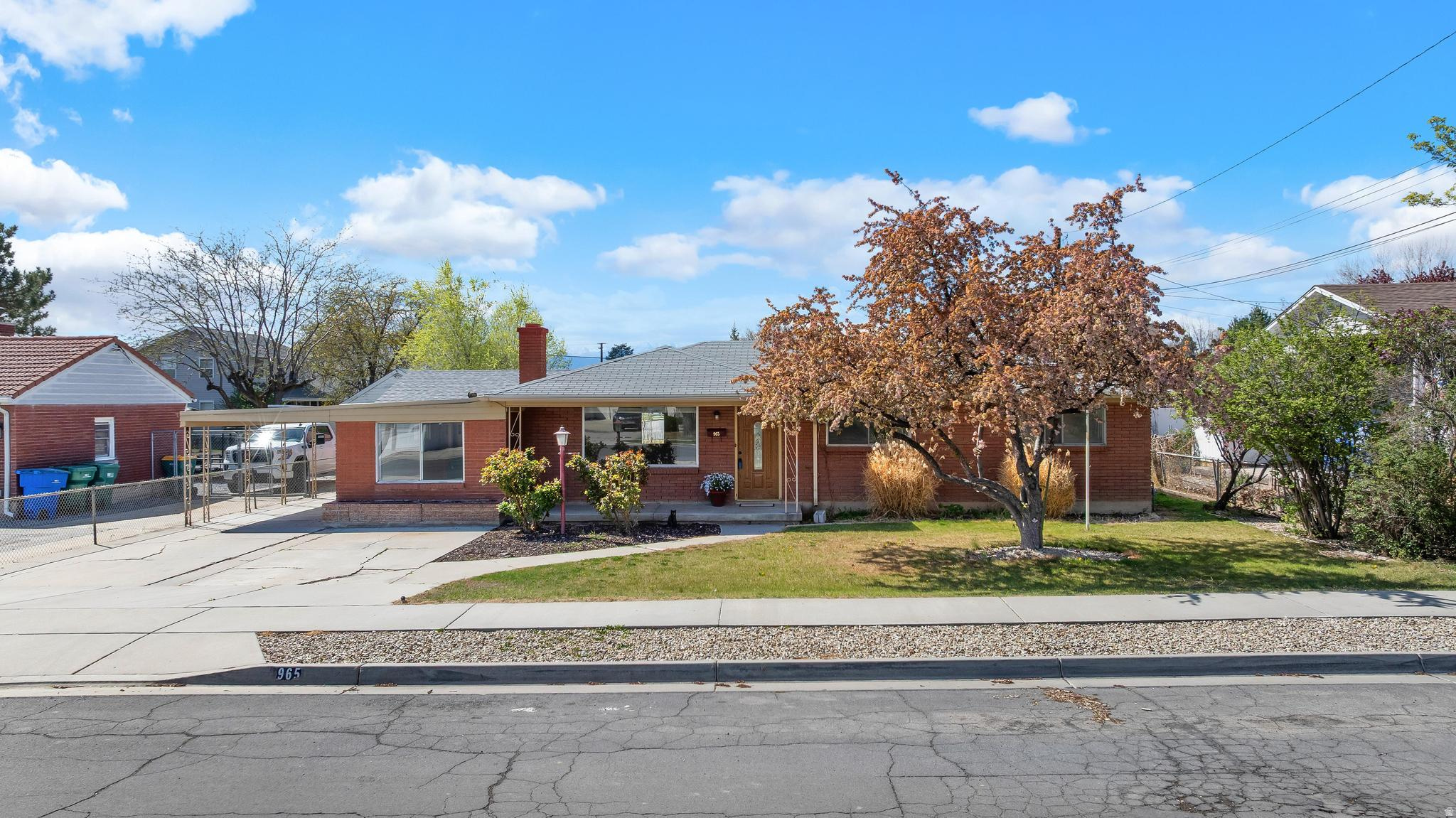 ***HUGE PRICE REDUCTION*** Classic rambler in the heart of Lehi. This 3 bed 2 bath home features two family rooms, large windows with tons of natural light, fresh paint, newer flooring, and is full of charm and character. Enjoy a large, fully fenced and landscaped yard with a covered patio and tons of storage space in the extra width garage and attached storage building. Park and store RV's, trailers, and toys through the additional backyard access or simply utilize the huge garden and lawn area.  Fantastic home, great neighbors, and quick access to I-15, schools, shopping, and dining. Schedule your private showing today. ***Square footage figures are provided as a courtesy estimate only and were obtained from county records. Buyer is advised to obtain an independent measurement.