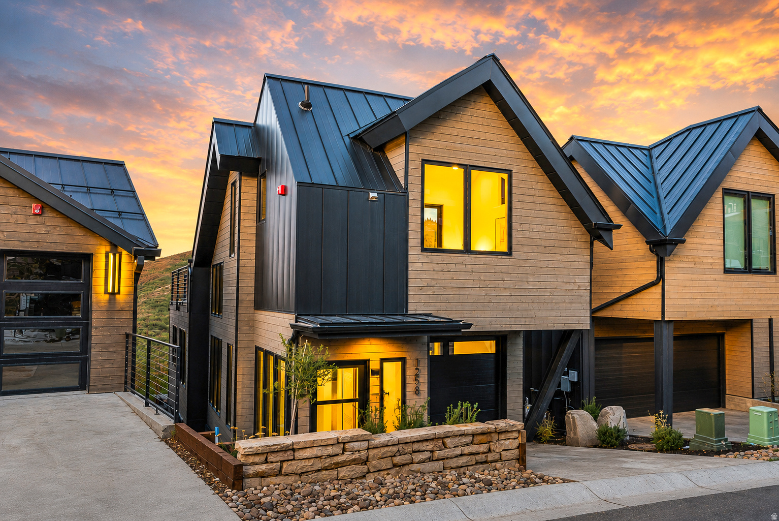 Discover unparalleled luxury in this stunning mountain modern home, ideally on the prestigious Kings Crown run in Old Town Park City. This property is ideal both as a primary residence or an investment opportunity, making it a perfect retreat for embracing the ultimate Park City lifestyle. Spanning over 2,500 sq. ft., this ski-in, ski-out masterpiece offers a seamless blend of contemporary design and cozy mountain charm. The open-concept living area features expansive windows that bathe the space in natural light while framing breathtaking mountain views. High-end finishes abound, including rich hardwood floors, a state-of-the-art chef's kitchen with top-of-the-line appliances, and exquisite details throughout. Each of the three bedrooms is a sanctuary of comfort, with luxurious bathrooms and 2 primary suites featuring their own private en-suite and spa-like baths. The bonus bedroom can be used for anything you desire; it is currently being used as a bunk room. A fully permitted and successful Nightly rental generates the most on King's Crown. The home comes fully furnished with meticulously chosen pieces that complement its elegant aesthetic. Enhancing your experience, the private ski tower provides direct slope access, while the owner's lounge and ski lockers offer added convenience and luxury. An elevator to the run and thoughtful details throughout ensure effortless living. Conveniently located a 2-minute drive or a 5-minute walk from Main Street, you're close to all the shopping, dining, and amenities Park City offers. Square footage figures are provided as a courtesy estimate only and were obtained from an appraisal. Buyer is advised to obtain an independent measurement.