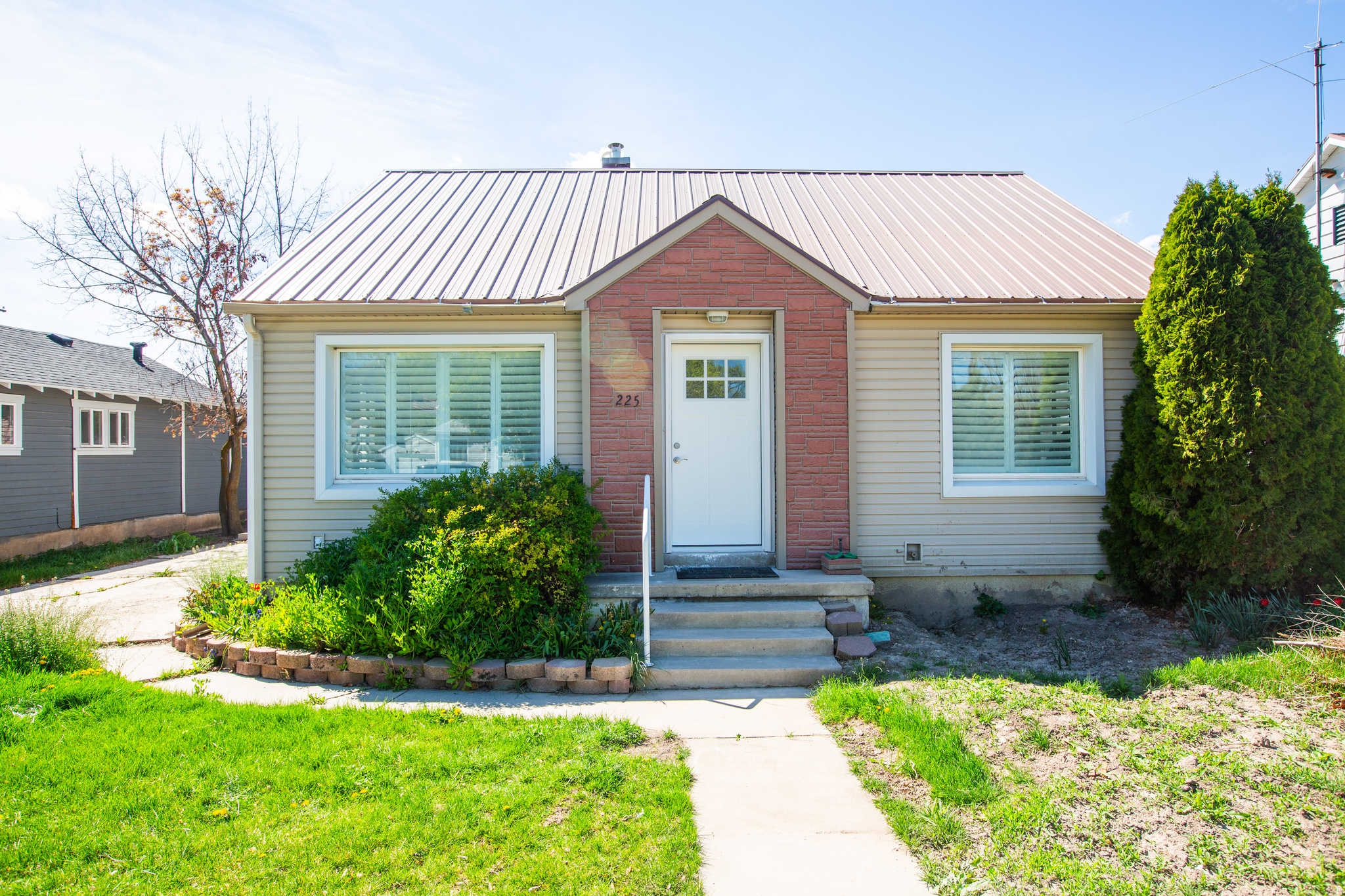 Welcome to this charming 3-bedroom, 2-bath home in the welcoming community of Tremonton, located in a quiet neighborhood near the town center with convenient access to I-15 for an easy commute. This home offers comfortable single-level living, with two recently remodeled basement bedrooms featuring new flooring, fresh paint, and added insulation-perfect for family, guests, or a home office. The property provides excellent storage with two basement storage areas and two spacious outdoor sheds, while the durable metal roof offers long-term reliability and low maintenance. The lot is accessible from the main street with an alleyway behind, adding convenience and flexibility. Ideal as a starter home, downsizing opportunity, or investment property, this home combines comfort, practicality, and value. Residents enjoy Tremonton's friendly small-town atmosphere, local amenities, and easy access to outdoor recreation and major commuting routes.  Schedule your showing today and see all this Tremonton home has to offer.