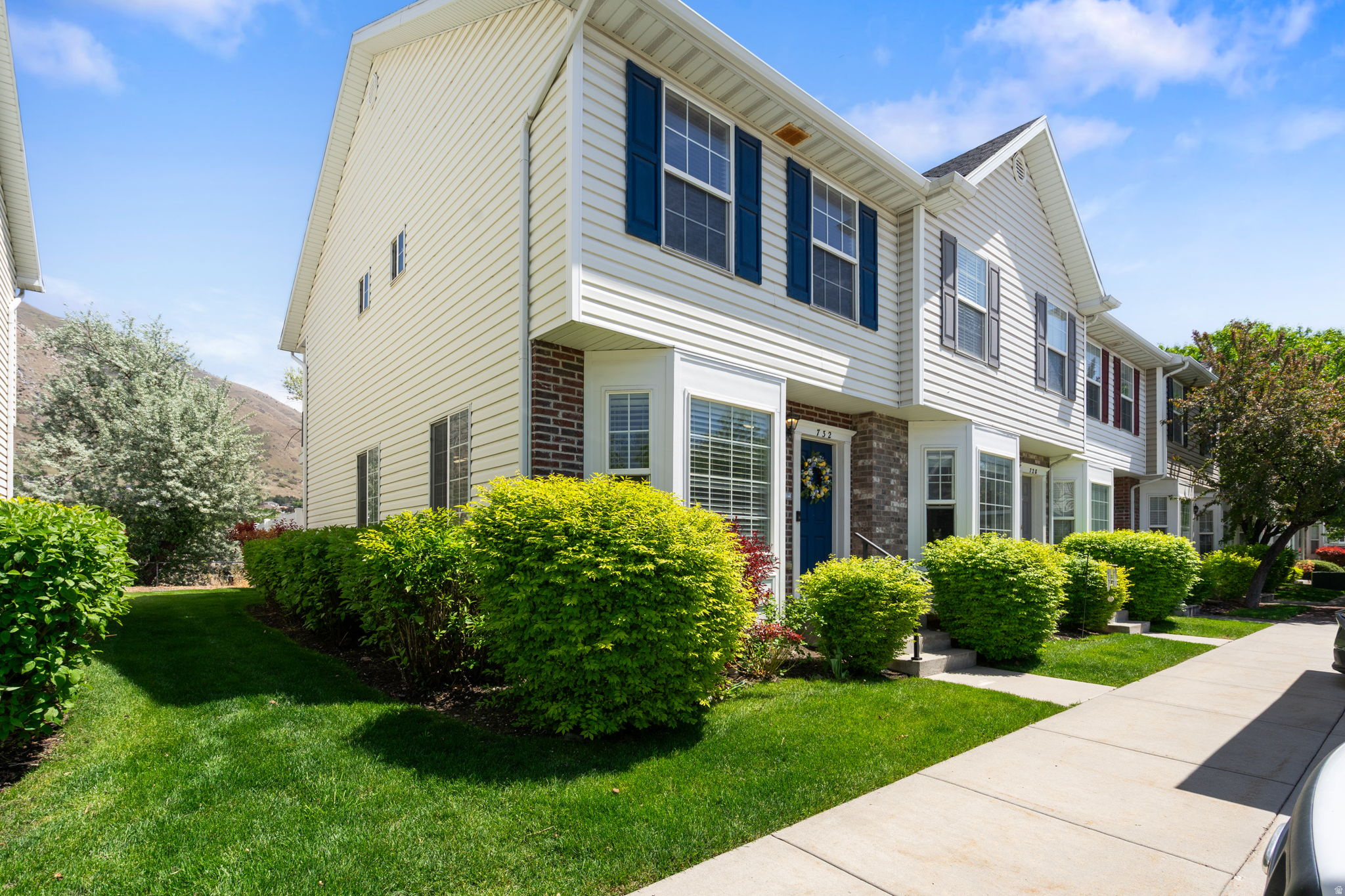 End units like this don't come up often-and once you see what it offers, you'll understand why. This beautifully updated Springville townhome is perfectly positioned with only one shared wall, allowing for more natural light, added privacy, and a quieter living experience. Backing to a large natural preserve, you'll never have backyard neighbors-just open space, incredible mountain views, and peaceful surroundings. Inside, you'll find two spacious primary suites, each with its own en suite bathroom-ideal for flexibility, guests, or roommates. One suite even features a private balcony overlooking the preserve and mountains, creating the perfect place to unwind. The main floor half bath adds convenience for guests, and the fresh, bright white paint gives the home a clean, modern feel throughout. Located in Springville with quick freeway access, nearby shopping, and endless outdoor recreation, this is the kind of property buyers wait for!   Square footage figures are provided as a courtesy estimate only and were obtained from county records.  Buyer is advised to obtain an independent measurement.
