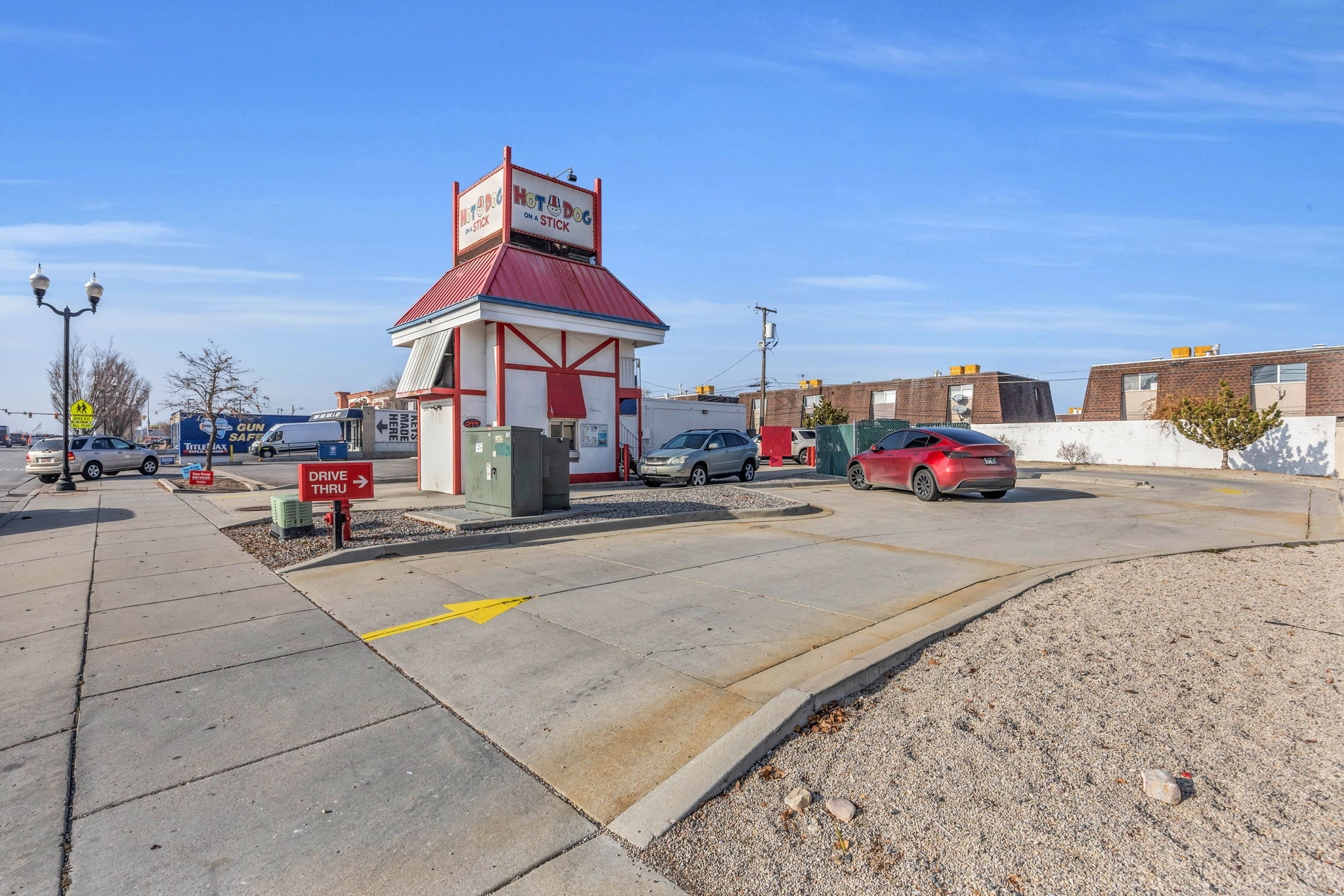 Includes 2 parcels: 15-26-354-043 & 15-28-354-042. This is a prime opportunity in West Valley City to open your first restaurant or a second location. Double Drive thru with capacity to have 9 cars in the driveway and 4 parking stalls. Strategically located amidst multifamily developments, office, retail and single family homes. A well equipped commercial kitchen, including grease trap, hood, fire suppression system, commercial sink, food prep tables, cook table, ice machine and other items. Plumbed for gas or electric. Square footage & figures are provided as a courtesy estimate only. Buyer is advised to get independent measurement. CALL AGENT FOR APPOINTMENT.