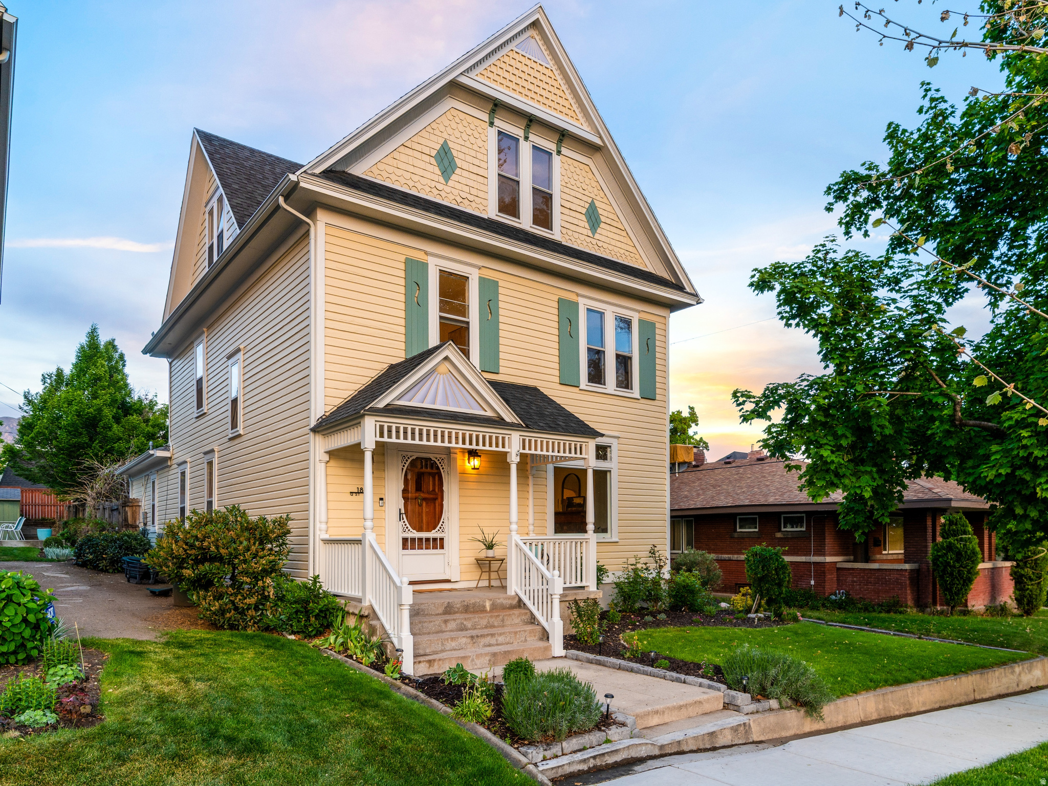 Historic Avenues Open House Event | Sunday, May, 24th | 1-3 pm. Tucked along one of the most iconic streets in the coveted Historic Avenues, this timeless Victorian blends old-world character with the kind of thoughtful updates today's lifestyle demands. From the moment you arrive at 180 Q Street, there's an unmistakable sense of warmth, sophistication, and storybook charm, where historic architecture meets elevated city living in one of Salt Lake City's most beloved neighborhoods.  Inside, rich hardwood floors, intricate moldings, soaring ceilings, and sun-drenched windows create a home that feels both grand and inviting. Gracious formal living and dining spaces set the stage for everything from intimate dinner parties to cozy evenings at home, while custom hand-painted ceiling details add a layer of artistry and character rarely found today. The recently updated kitchen and bathrooms beautifully honor the home's historic soul while incorporating fresh, refined finishes and modern functionality. Equally important, the major systems have already been updated-including electrical, HVAC, and more-offering peace of mind without sacrificing charm.  Beyond the interiors, the outdoor spaces feel like a private, hidden garden in the heart of the city. The expansive yard is a true rarity in the Avenues, complete with a tranquil waterfall and koi pond, vibrant flower beds, a covered patio, and even a custom playhouse tucked among the greenery. Whether you're hosting summer gatherings, enjoying morning coffee under the trees, or unwinding after a night downtown, the lifestyle here is unmatched. A coveted 2-car garage adds even more convenience-an exceptional find for the neighborhood.  All of this is just moments from downtown Salt Lake City, local cafs and restaurants, City Creek Center, Eccles Theater, the University of Utah, hiking trails, and everything that makes Avenues living so special. Historic, stylish, spacious, and effortlessly livable, 180 Q Street is the kind of home that rarely comes available and never goes out of style. Features & Recent Updates:  Refinished and newly installed hardwood floors, including all new stair treads  Entire house rewired  New fence  Full exterior wood repair and complete repaint of house and garage (within the last year)  New gutters (within the last year)  All new kitchen appliances  New sewer lining  Updated seismic improvements completed by engineer  Updated brick caps on both chimneys  New bathroom flooring  Kitchen remodel  New landscaping  New outdoor composite deck, See attached document for Features & Upgrades. Square footage figures are provided as a courtesy estimate only and were obtained from the previous MLS.  Buyer is advised to obtain an independent measurement.