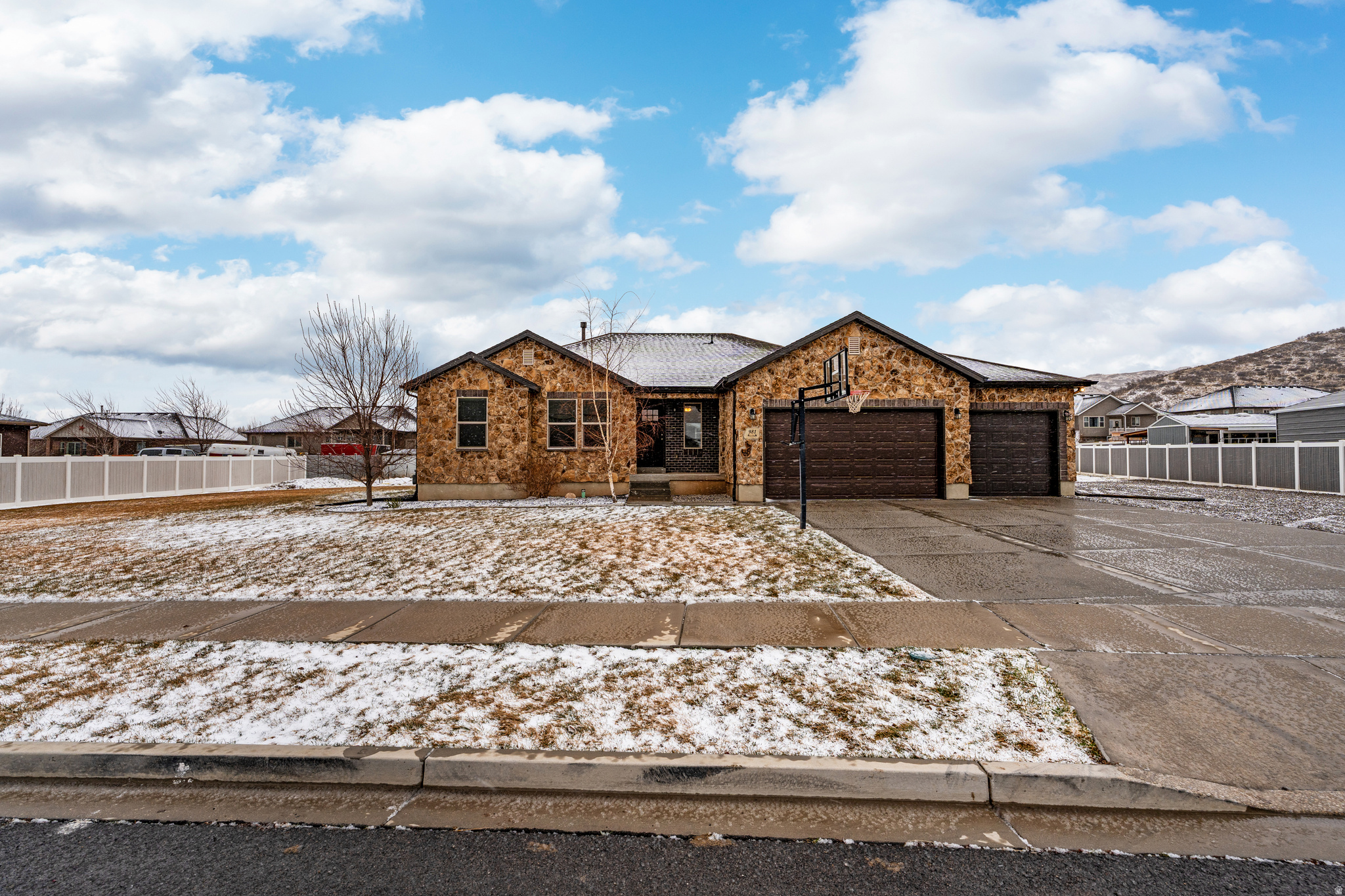 PRICE REDUCTION! Fully renovated 4 bed, 3 bath home on a spacious 1/3 acre with incredible mountain views. Newly finished basement adds extra living space. Features a 3 car garage and RV parking pad. Updated throughout with a functional layout perfect for everyday living.