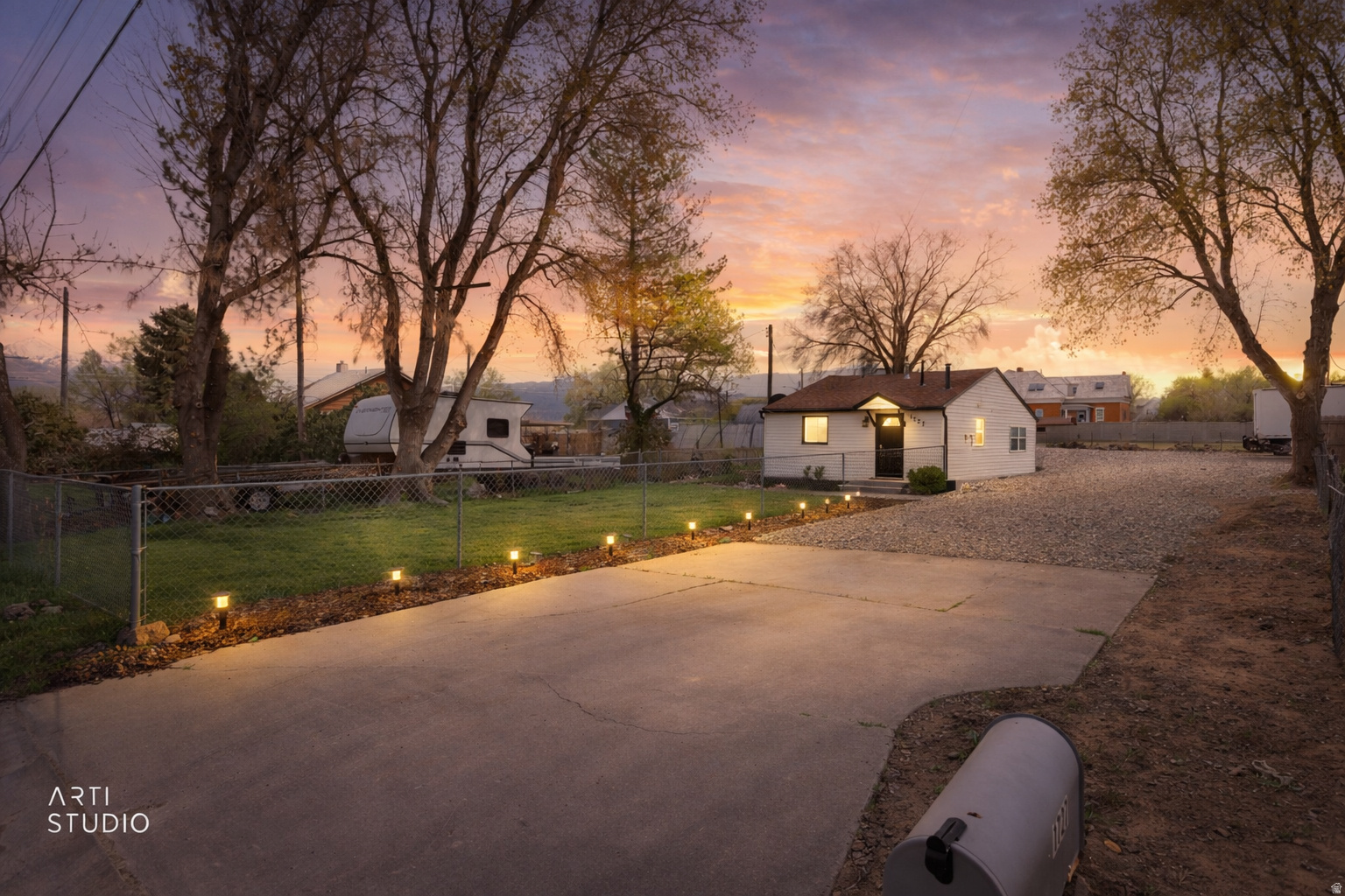 Welcome home to this charming, beautifully renovated Riverton cottage nestled in the peaceful Oquirrh Hills neighborhood. Surrounded by mature trees, mountain views, and quiet streets, this inviting property offers more than just a home it offers opportunity, freedom, and a place to build a future.  Perfect for first-time buyers, newlyweds, investors, or those looking for a mother-in-law setup or Airbnb opportunity, this cozy 2-bedroom, 1-bath home with a den creates a rare chance to own instead of rent and begin building equity at a young age.  Inside, you'll find thoughtful modern upgrades paired with a warm, welcoming feel. The remodeled kitchen features stainless steel appliances, updated finishes, a smart thermostat, and a layout designed for comfortable everyday living.  Outside, the fully fenced 0.13-acre lot offers open patio space for relaxing evenings, gatherings with friends and family, mature shade trees, outdoor lighting, storage shed, and parking for up to 5 vehicles... all with NO HOA.  Conveniently located just minutes from shopping, parks, schools, restaurants, and freeway access, this home combines peaceful living with everyday convenience.  Whether you're searching for your very first home, a fresh start as newlyweds, a smart investment property, or a cozy space for extended family, this property delivers warmth, flexibility, and long-term value. Homes with this kind of charm, versatility, and affordability are becoming harder and harder to find.  Come experience the feeling of home and the power of ownership.