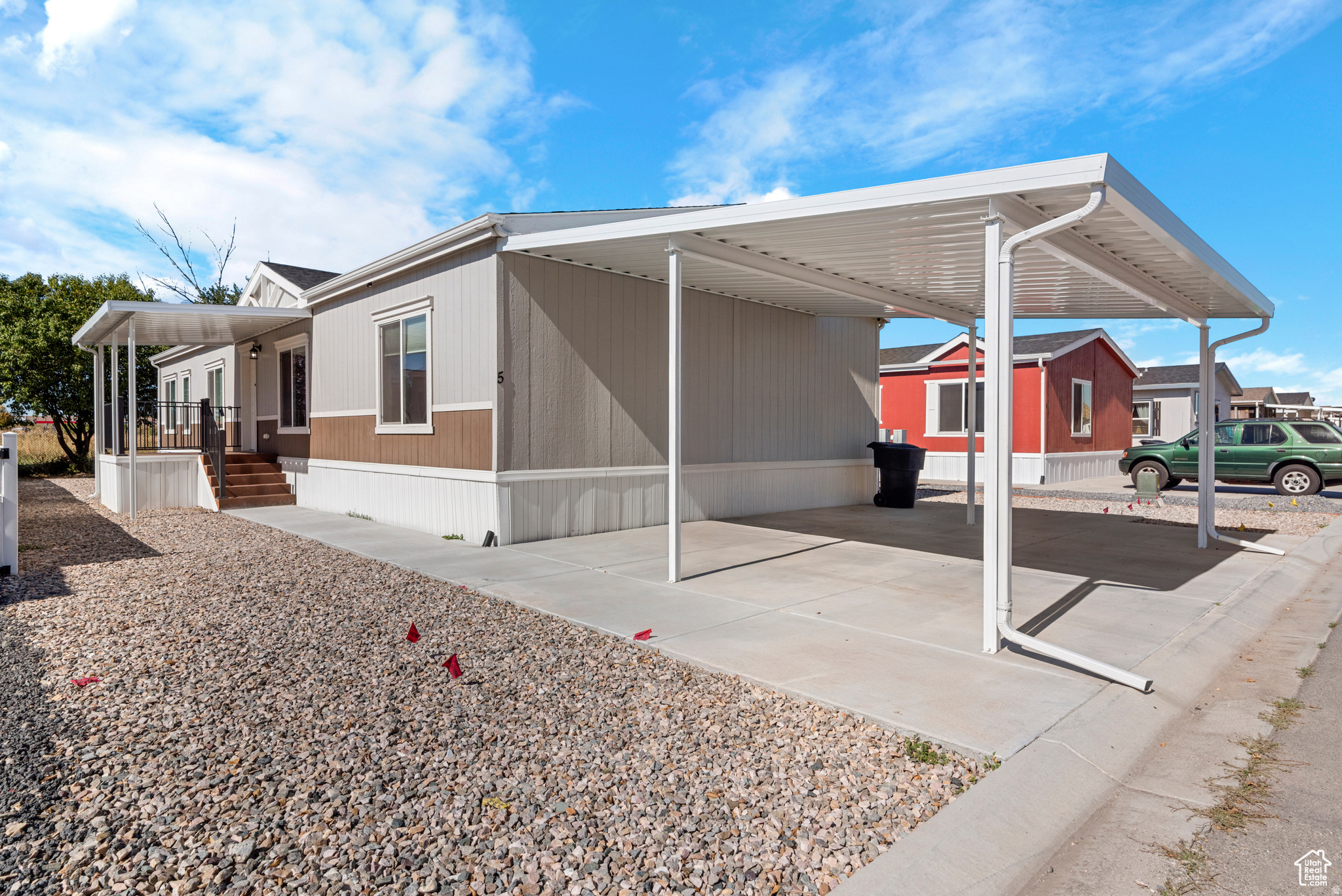 Built in 2023, this manufactured home offers 4 bedrooms and 2 bathrooms, with a well-designed floor plan that features an open concept layout with large living areas, making it ideal for entertaining. The primary bedroom includes a spacious bathroom and walk-in closet. Home has 2 covered decks, 2-car covered carport, and a fully xeriscaped yard, allowing for minimal maintenance. Located within walking distance of local restaurants and has nearby freeway access. Wasatch View Estates will offer many community amenities, such as a swimming pool, pickleball court, playground, and much more. Be sure to check out the 3D tour above. All information herein is deemed reliable but is not guaranteed; buyer is responsible to verify all listing information, including square feet/acreage, to buyer's own satisfaction.
