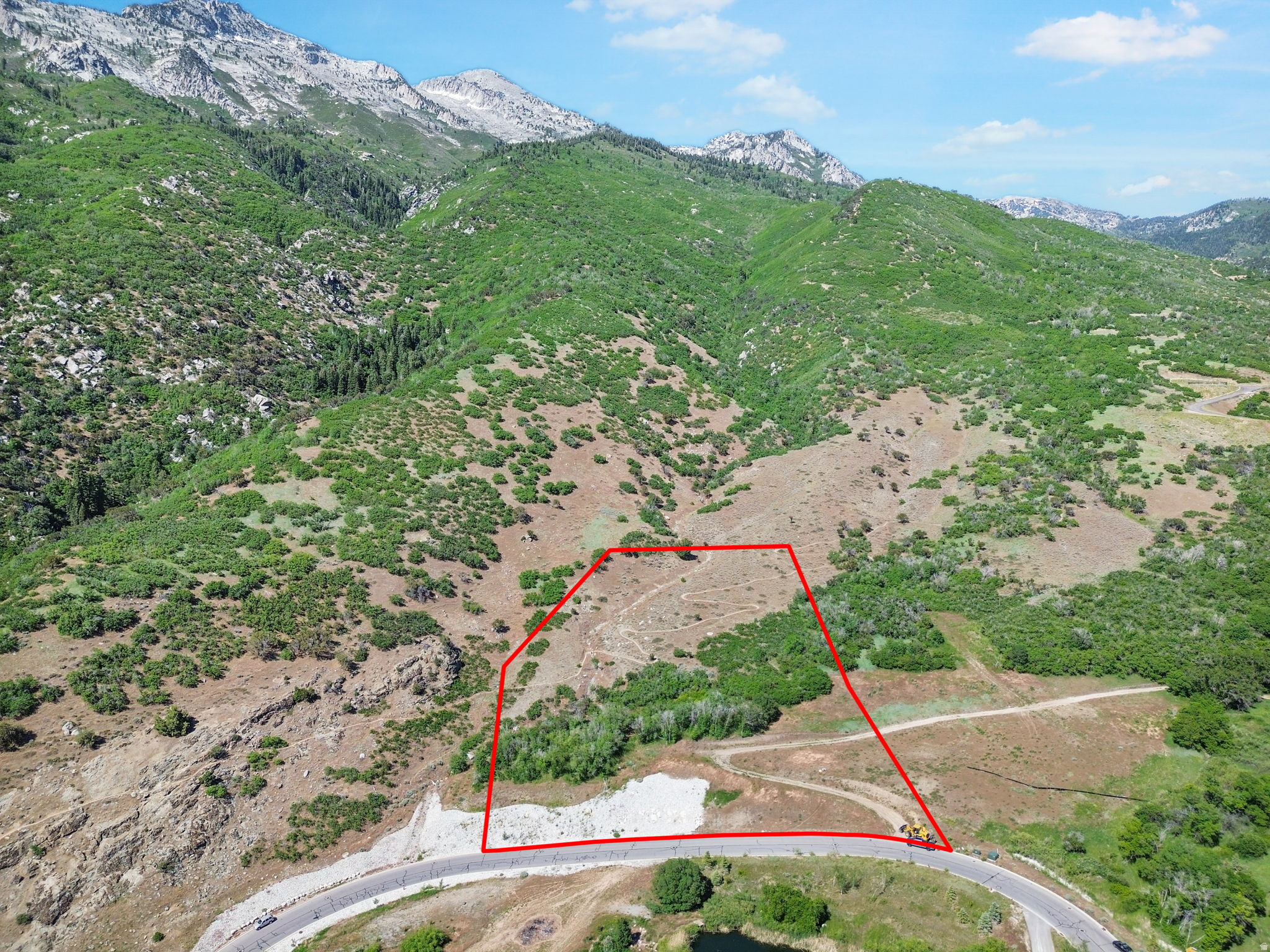 Next to open space, great mountain views, over looks pond.  Easy access to trails. One of the last lots available from Development group.