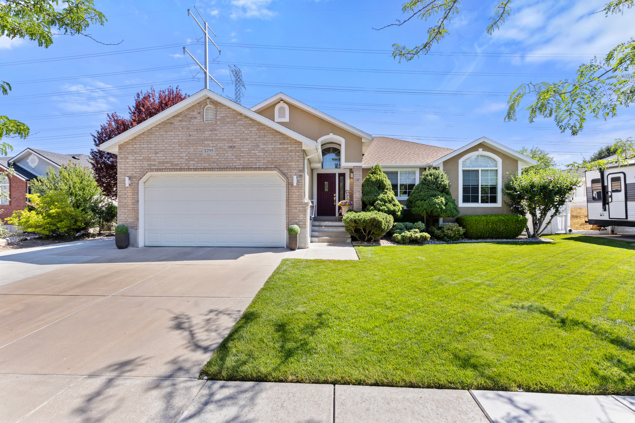 Welcome home to this beautifully updated 6-bedroom, 3-bathroom home in Kayscreek Estates,one of Layton's most convenient locations. This home has been meticulously maintained, updated and has a roof that is only 6 years old.  You'll enjoy easy access to open space across the street and a place for the kids to play, all while having no backyard neighbors for added privacy. Inside, you'll find a thoughtfully updated interior featuring a gorgeous kitchen with modern finishes and beautifully remodeled bathrooms throughout the home. With six spacious bedrooms and multiple living areas, there's plenty of room for everyone to spread out and enjoy. Step outside to a meticulously landscaped yard designed for both relaxation and entertaining. The backyard also includes a powered storage shed, making it the perfect space for a workshop, hobby area, or extra storage. Located within walking distance of both the elementary school and junior high, this home offers the ideal combination of comfort, convenience, and location. With its extensive updates, spacious layout, and hard-to-find privacy, this is one you won't want to miss!