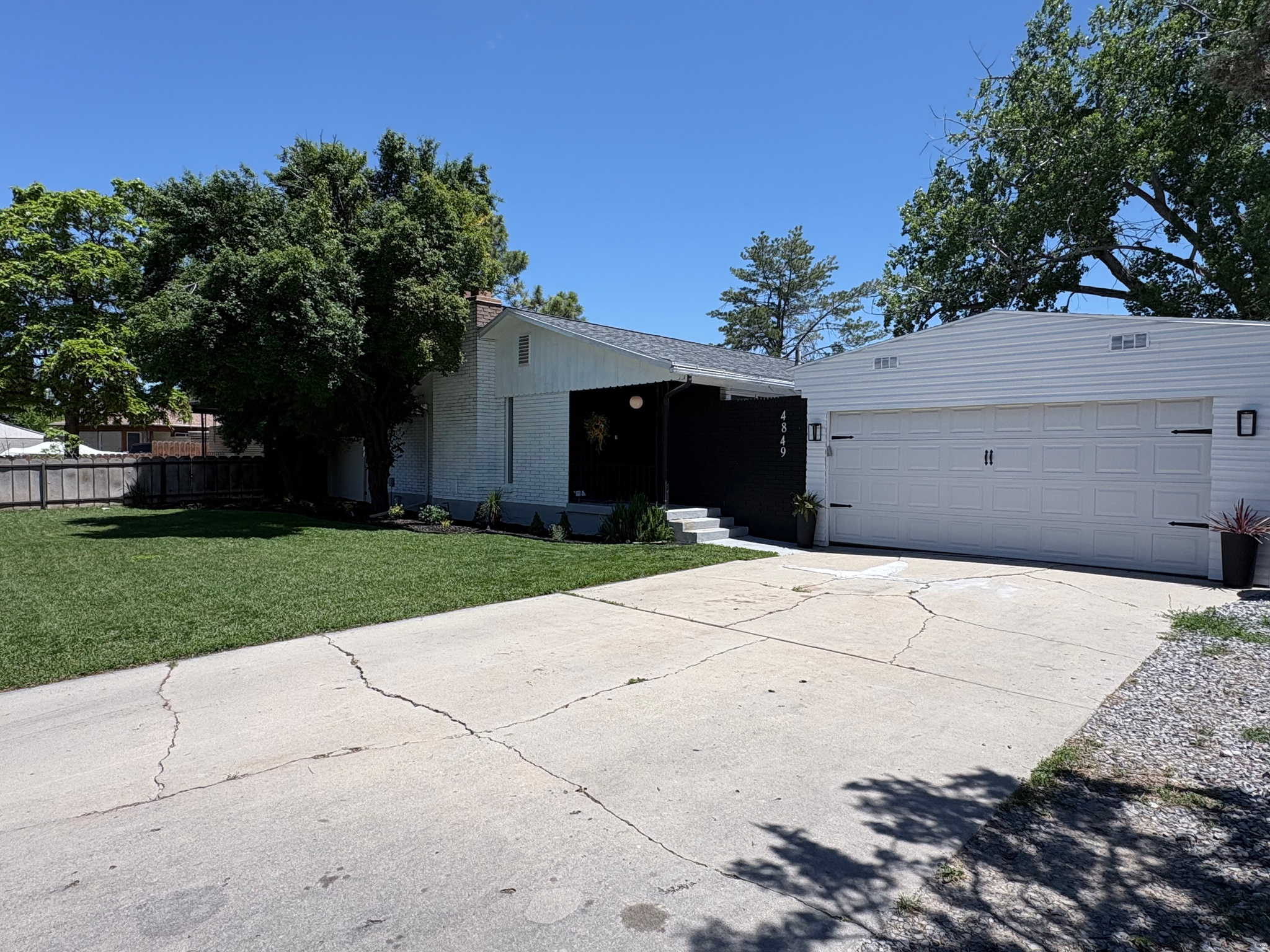 Showings begin Monday, June 15. Welcome to this beautifully updated Taylorsville home! Kitchen updated with quartz countertops and all stainless steel appliances are included. Bathrooms have been renovated. New laminate flooring throughout the home. New paint inside and out. Water heater replaced and Radon Mitigation System installed two years ago. New roof installed 5 years ago and furnace and AC are 8 years old. Minutes from I-215. Square footage figures are provided as a courtesy estimate only and were obtained from appraisal.  Buyer is advised to obtain an independent measurement.