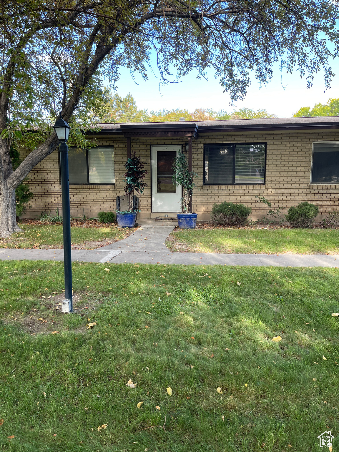 Rare opportunity in Ridgeland Downs, West Valley! Main-level all-brick rambler with central air in a quiet, well-kept community. ENJOY TRUE PRIVACY-NO UPSTAIR OR DOWNSTAIR NEIGHBORS. Private gated BACKYARD PATIO. Also, enjoy shade trees, landscaped grounds, basketball court, playground. Includes 2 parking stalls (1 covered) + oversized storage. Minutes to Valley Fair Mall, schools, parks, freeway, Bangerter Hwy & only 10 min to downtown SLC! Second refrigerator in carport storage included in the sale. **Property may qualify for Single-Unit (Spot) FHA Approval even though the complex is not approved as a whole.**