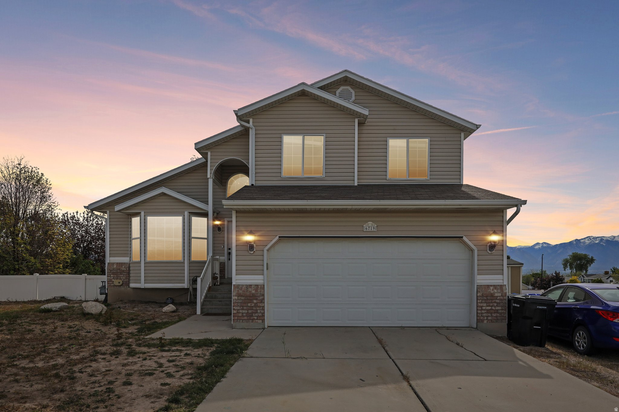 PRICE REDUCED TO $574,900 + NEW LANDSCAPING! Welcome to this stunning 5-bedroom, 3.5-bath tri-level home in the sought-after Suncrest Ridge community of West Jordan. Beautifully updated and recently enhanced with modern upgrades, including brand new front and back landscaping. Fresh paint throughout creates a bright, move-in ready atmosphere. Enjoy peace of mind with a brand new HVAC, Furnace, and energy-efficient tankless water heater, and upgraded appliances. Stay connected with blazing-fast Google Fiber internet already installed. The main level features an open-concept living area perfect for entertaining, while upstairs you'll find spacious bedrooms with ample natural light. The showpiece is the 100% finished walkout basement, providing additional living space, a three-quarter bath, and direct access to the private backyard. Enjoy mountain views and tranquil living on this 0.19-acre west-facing lot.