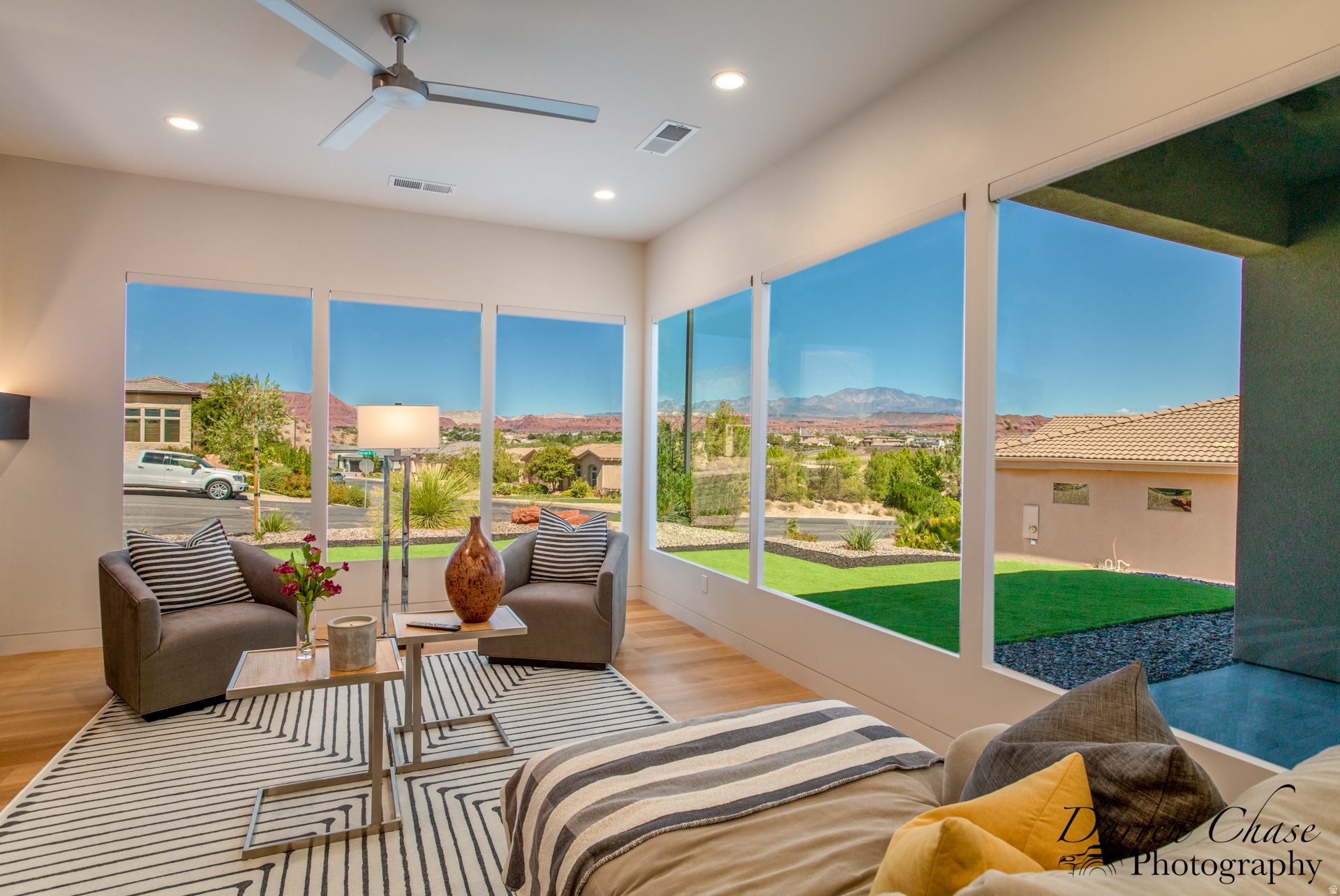 VIEWS VIEWS VIEWS! You've found the VIEWS you've been waiting for. Perfectly positioned above Sunbrook Woodridge Hole #3, this stunning custom home captures breathtaking 360 views of the golf course, surrounding landscape, and vibrant Southern Utah skies from nearly every room. Meticulously maintained with high-end appliances, induction cooktop, 8' solid wood doors, automatic blinds, rift oak cabinetry and flooring, plus five sheer walls, walk in butler pantry, and Soundproof room, wired for a hot tub, and move-in ready. Luxury living with unforgettable VIEWS.