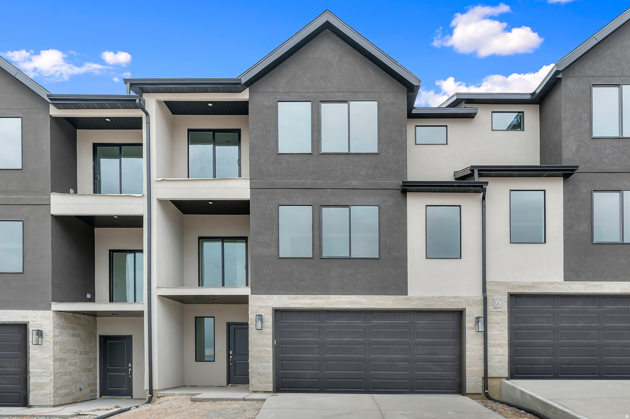 This new 3-story Overton townhome backs up to the mountain, so you get PRIVACY out back and views out front! Room for future bedroom and bathroom on main floor. Open layout with balconies off the 2nd and 3rd floors. Ask me about our generous home warranties, active radon mitigation system and Smart Home package which are all included in this home. $6,000 towards closing costs using our preferred lender. Actual home may differ in color/material/options. Pictures are of finished homes of the same floor plan and may contain options/upgrades/ decorations/ furnishings not available at the advertised price. No representation or warranties are made regarding school districts and assignments; conduct your own investigation regarding current/future school boundaries. Buyer to verify all information. Sales office hours are Monday, Tuesday, Thursday, Friday, and Saturday from 11:00am-6:00pm. Wednesday from 1:00pm-6:00pm.
