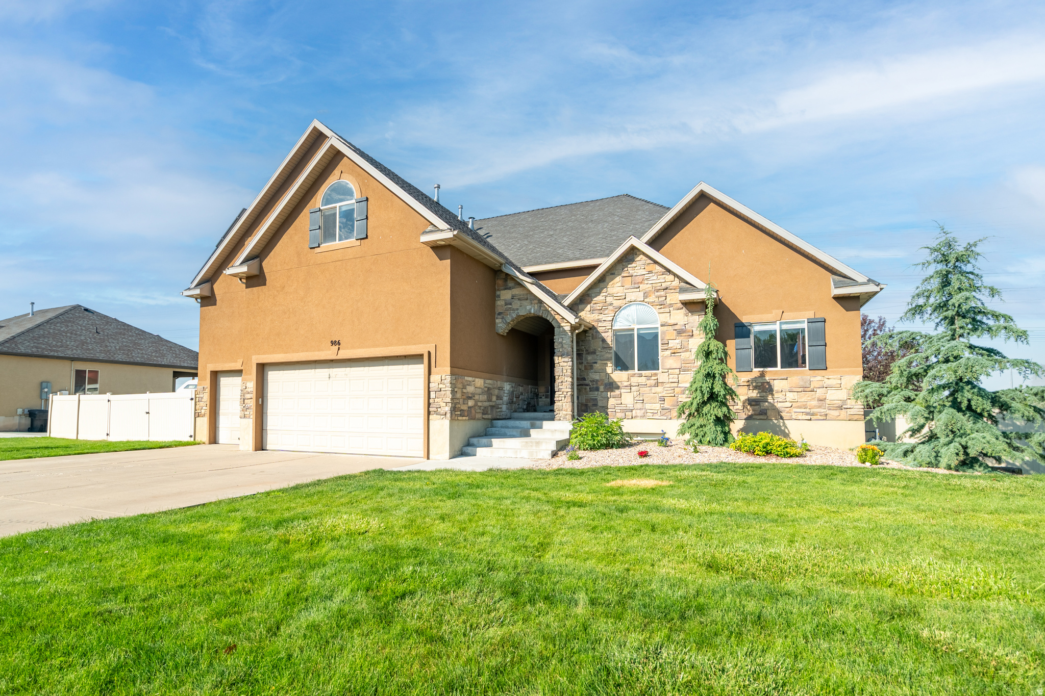 15K Price Improvement! Best deal on the market! Huge 8 bed, 5 bath home in West Kaysville with a newly finished walkout basement with kitchen and separate washer/dryer hookups-ideal for a mother-in-law apartment. Recent updates include paint, carpet, and laminate flooring all within the last 5 years. Features a beautifully remodeled kitchen with professional-grade appliances, LVP flooring, paid off solar panels, and fresh finishes throughout. Enjoy an awesome deck, swing set, and in-ground trampoline on a .31-acre lot. Located in a fantastic neighborhood with top schools and low HOA. Roomy, updated, and ready for new owners! Square footage figures are provided as a courtesy estimate only and were obtained from previous listing. Buyer is advised to obtain an independent measurement.