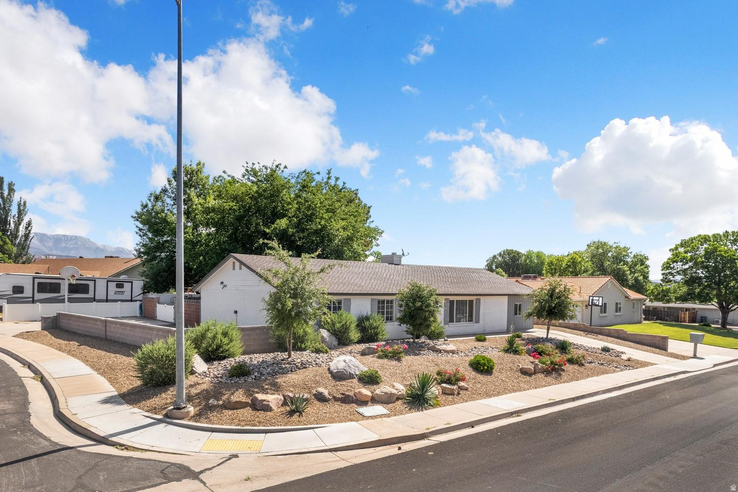 Santa Clara Heights! 5-bedroom corner-lot home with large RV/boat/trailer parking, mature landscaping & spacious living areas. Conveniently located near top-rated schools, parks, shopping, dining and Snow Canyon recreation. Tenant occupied..
