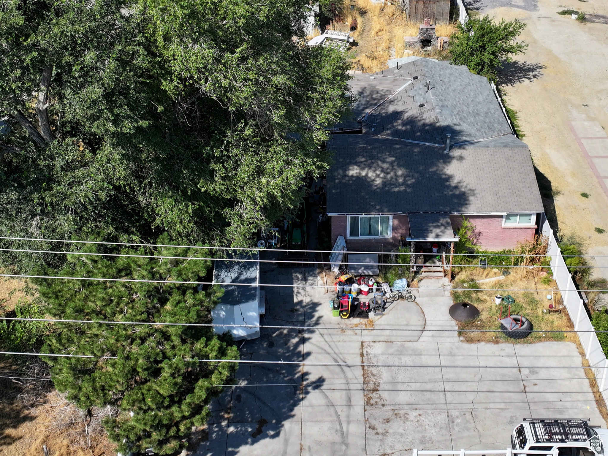PRICE IMPROVEMENT BY $133,333. BRING  YOUR BEST OFFER TO MAKE THIS YOUR NEW COMMUNITY. There are 3 parcels being sold together to equal 1.2 acres facing east on Redwood Rd. Listed with Parcel #21-34-377-034 and Parcel #21-34-377-022. The city has allowed .18 acre lots to the north and agreed that this would be allowed on these parcels as well. The road to the north is on title to be a right of way to these properties. THERE ARE TENANTS LIVING IN BOTH HOMES, PLEASE DO NOT DISTURB TENANTS OR THEIR PERSONAL PROPERTY. Please make an appointment with agent to view the properties. Square footage figures are provided as a courtesy estimate only and were obtained from the county. Buyer is advised to obtain an independent measurement.